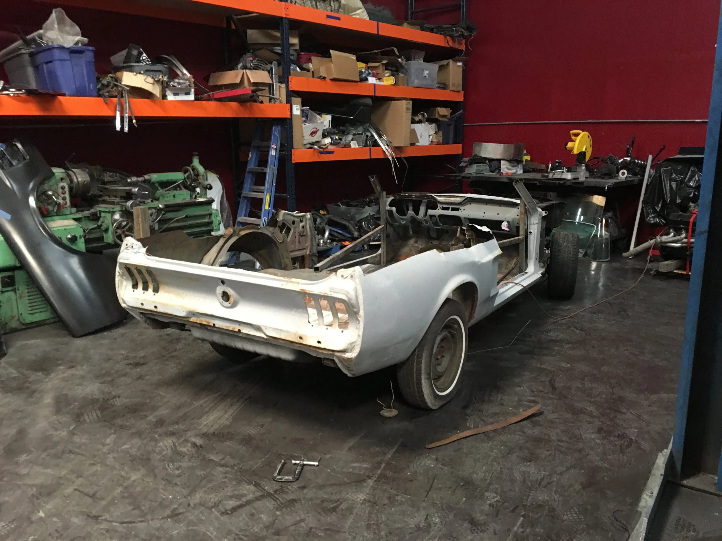 After some reinforcement, we cut the top off literally.  Our friends at Dynacorn happened to need a good roof for a project 