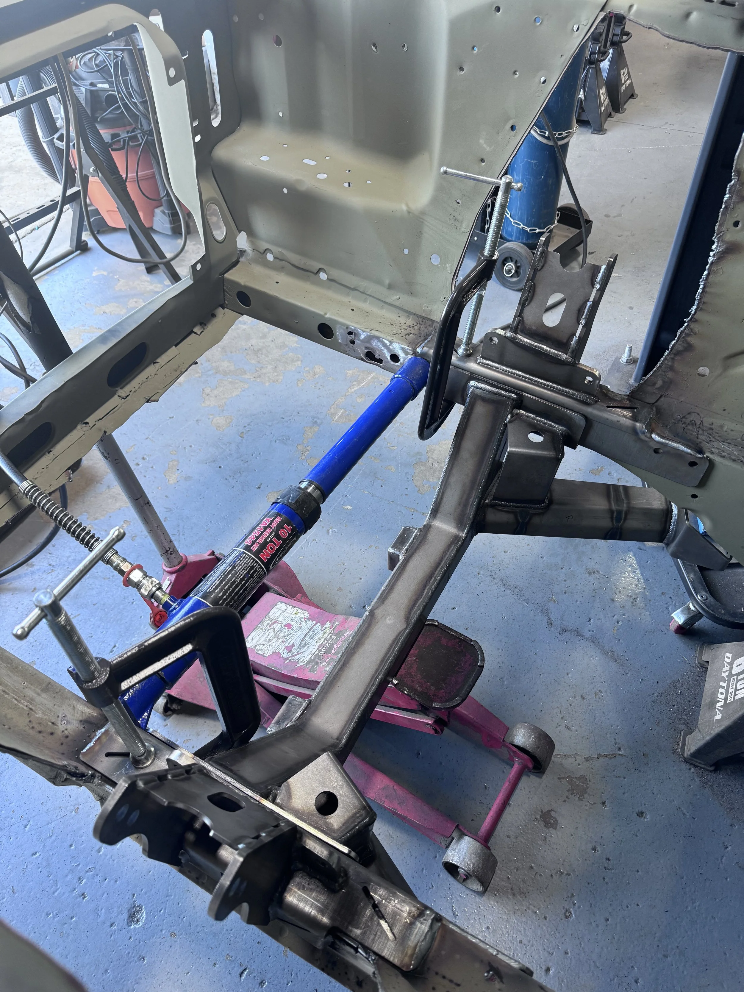 Sometimes you need an extra set of hands with gorilla strength!  Dry fitting a Heidts pro g crossmember 