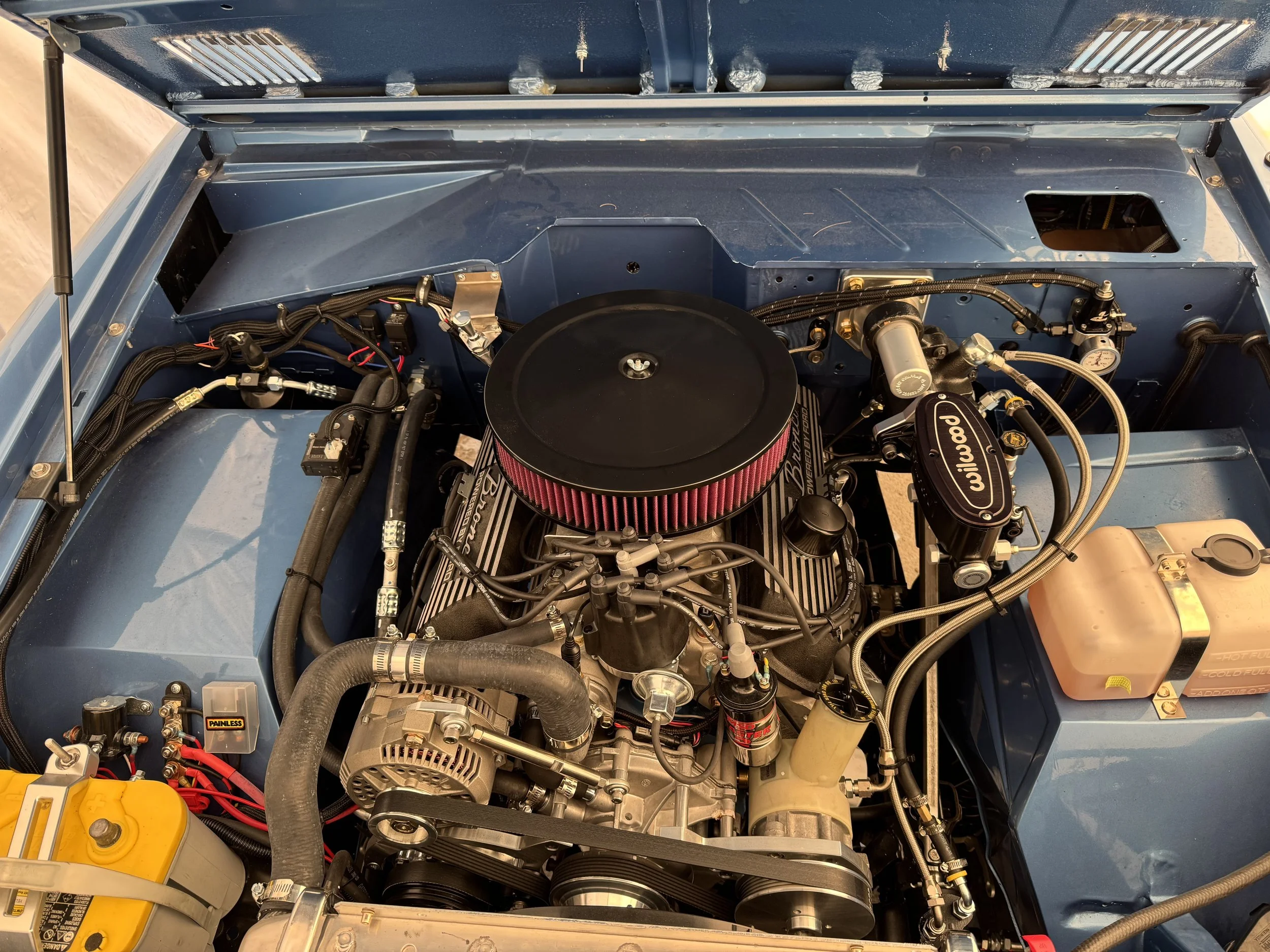 This 71 Bronco features a sniper 2 eft set up, painless wiring, amp steps and more.  