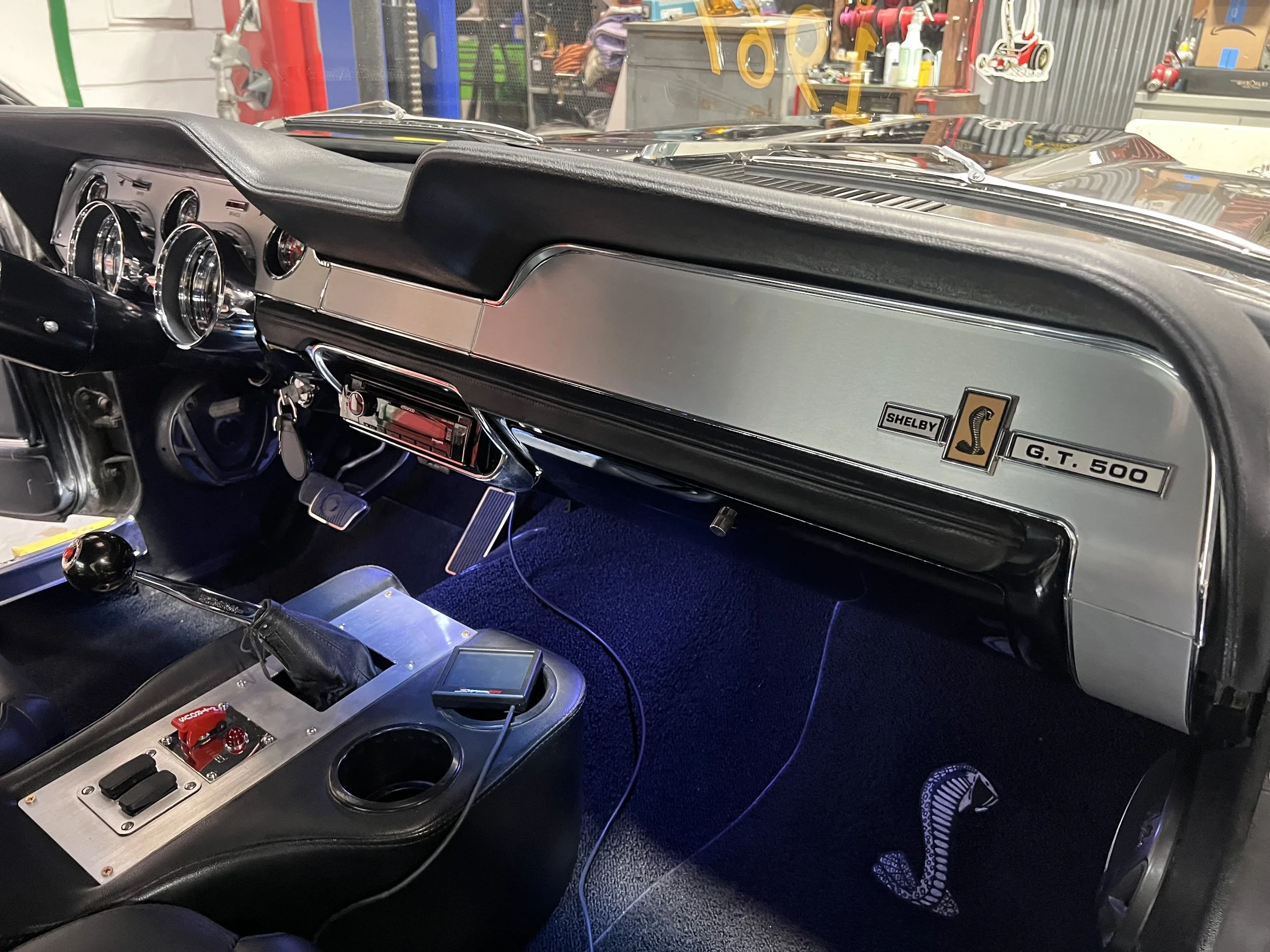 Better view of under lighting and console with brushed aluminum Shelby interior