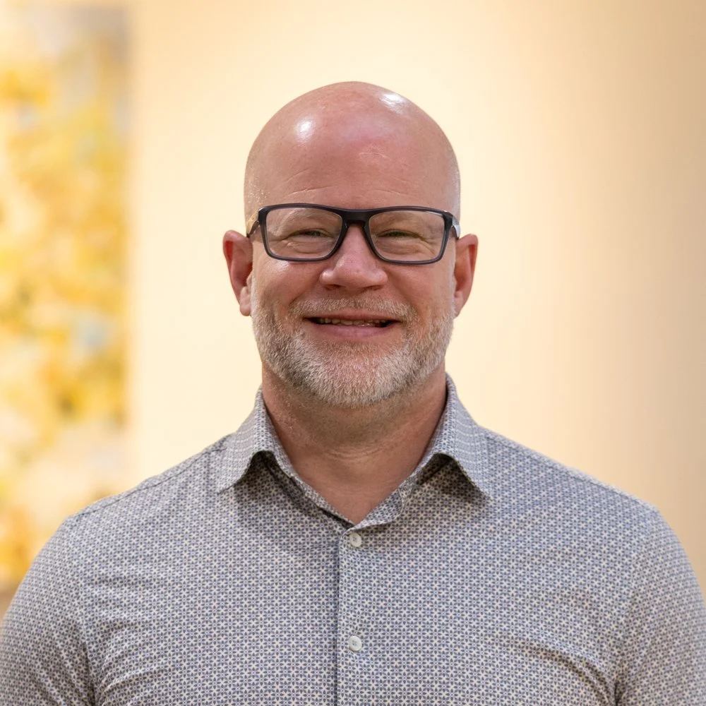 A portrait of Harrison Musser, Community Outreach Supervisor at Options Mankato.