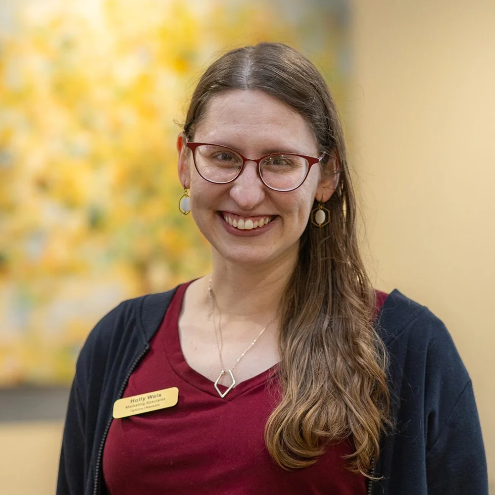A portrait of Holly Wels, Marketing Specialist.