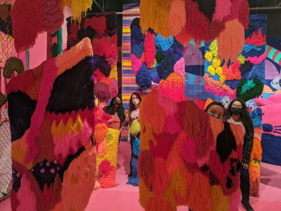 We highly recommend the "Intangible, A Fiber Fairytale" exhibit that will make you feel like a kid again. Left to right: Estefany Sanchez, Elizabeth Moeller, Rachel Birdwell, Milca Sanchez. (Photo by Crystal Correa)