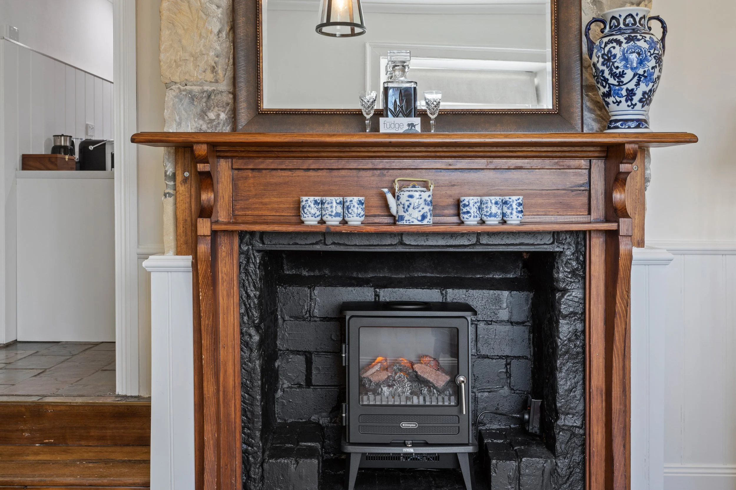 lythgos_row_cottages_historic_stays_tasmania_fireplace.jpg