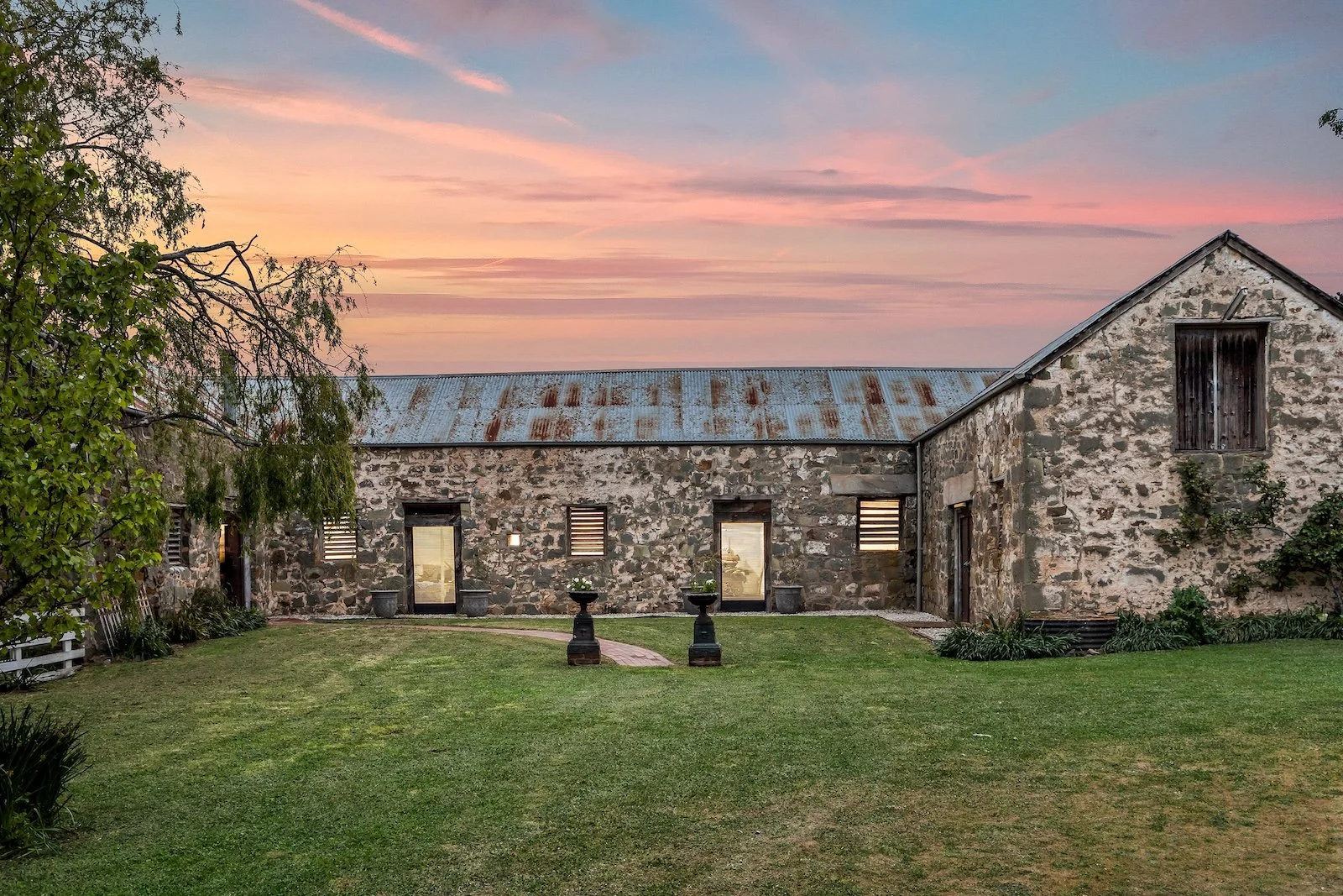 cleveland-house-tasmania-for-sale-stone-barn-sunset.jpg