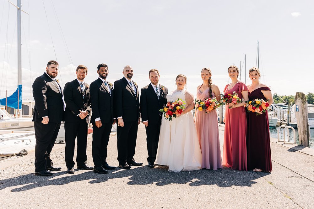northern michigan wedding party at the harbor springs marina