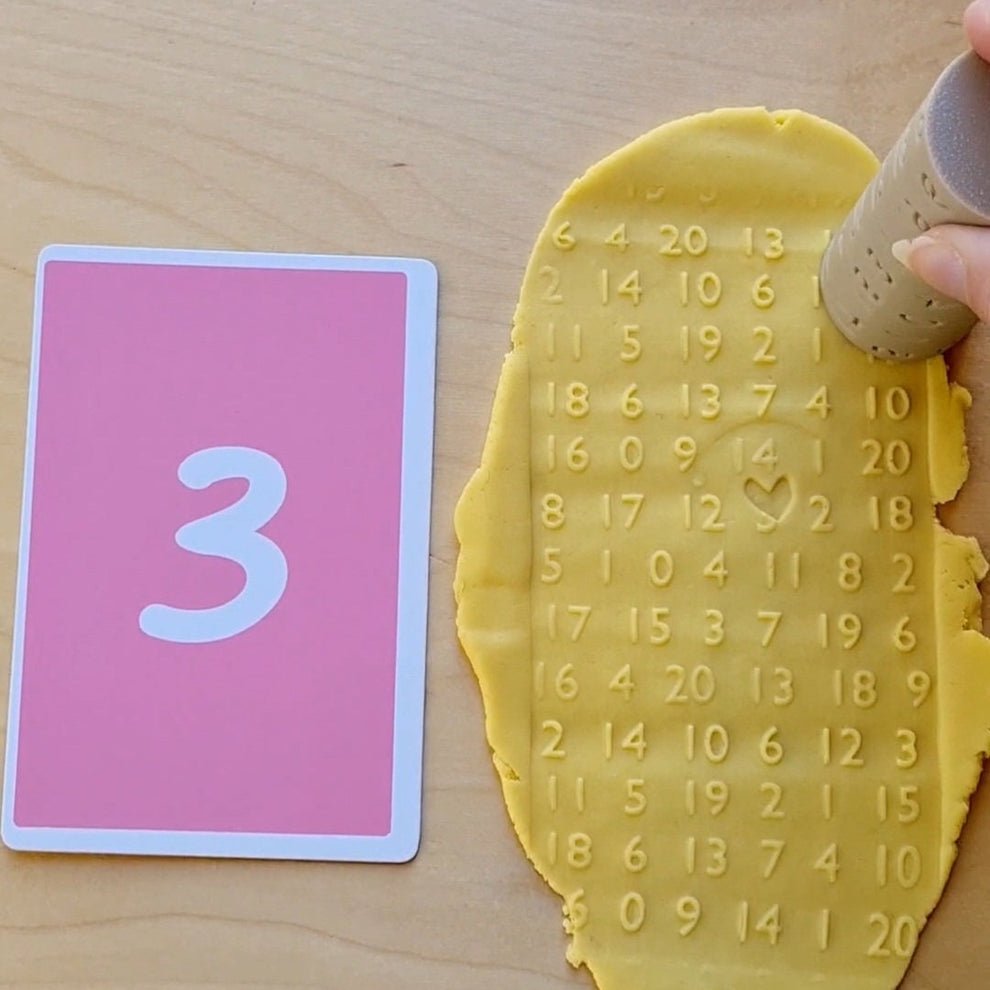 number recognition activity for preschoolers using playdough roller