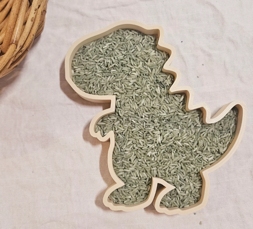 T-Rex dinosaur sensory tray for kids dinosaur play