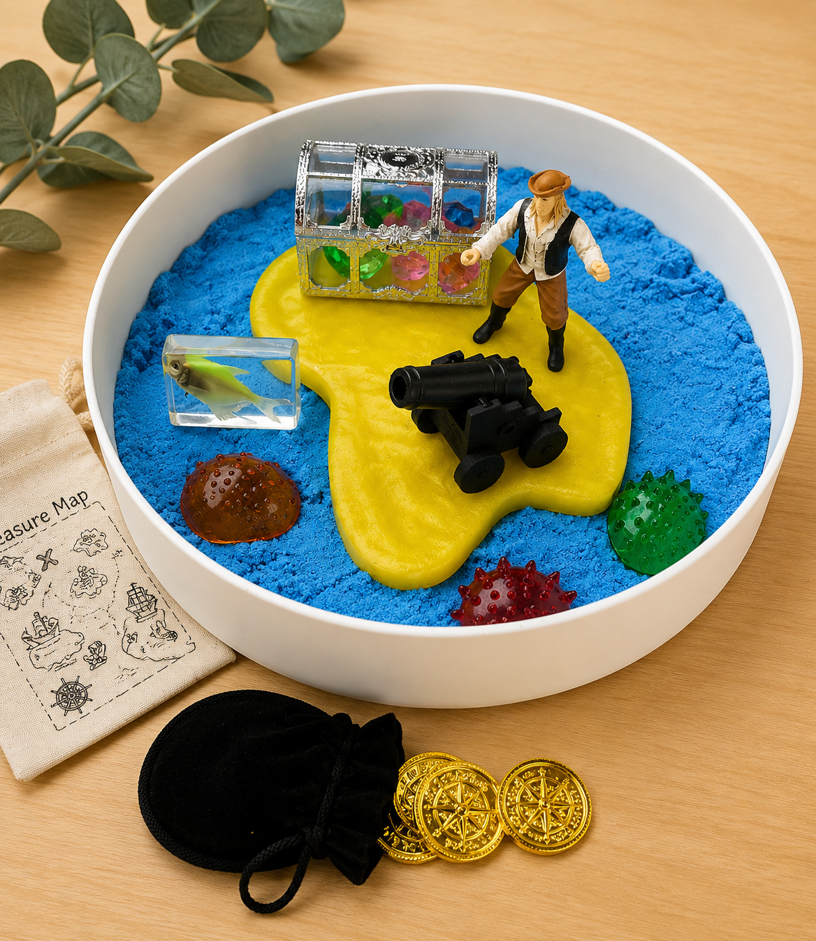 Pirate sensory kit contents with island, treasure chest, coins and loose parts