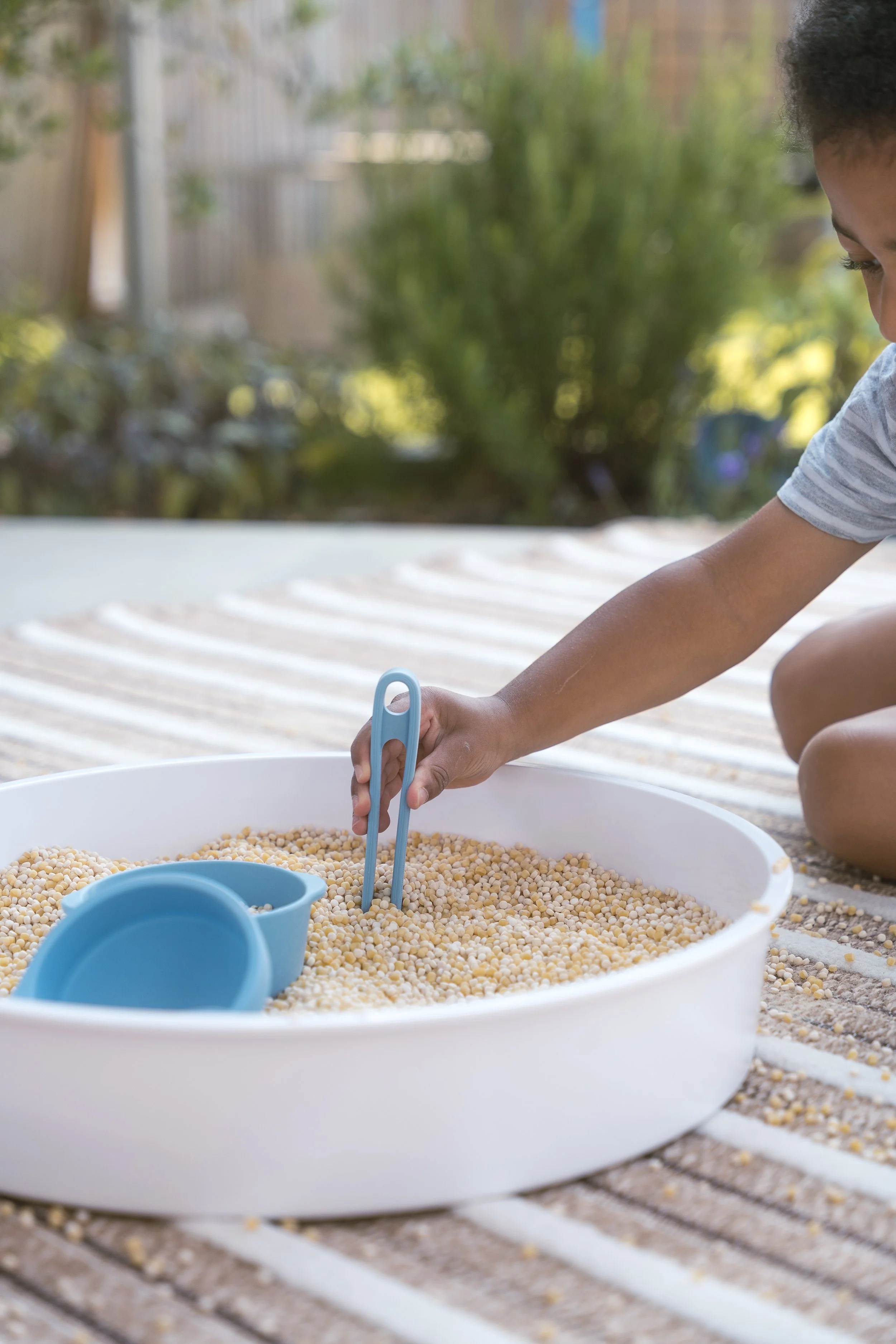 Sensory play starter tool kit with washable storage bag