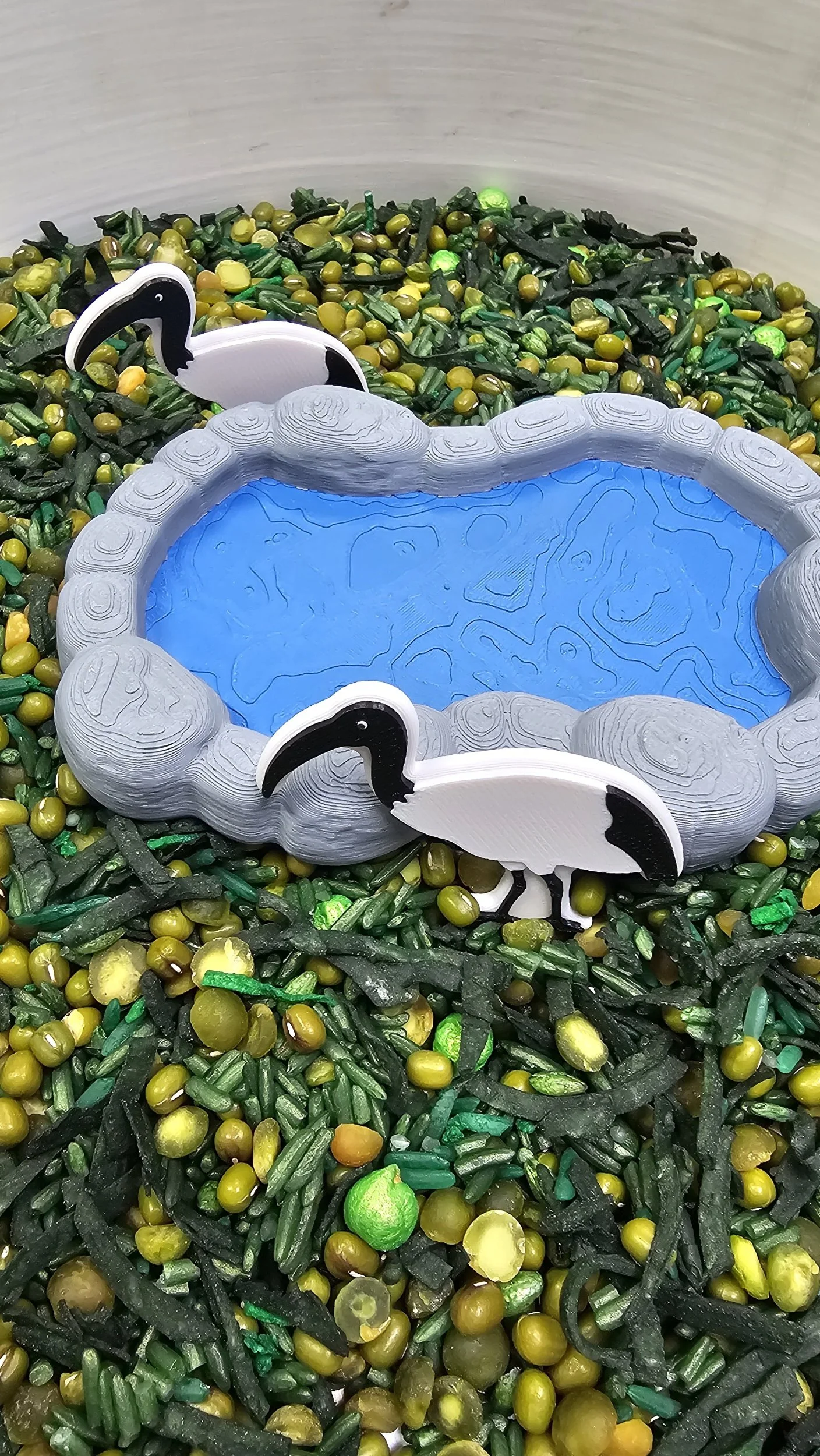 Pond Small World Scene Setter available in Natural Pond and Icy Pond designs for sensory play and imaginative small world activities.