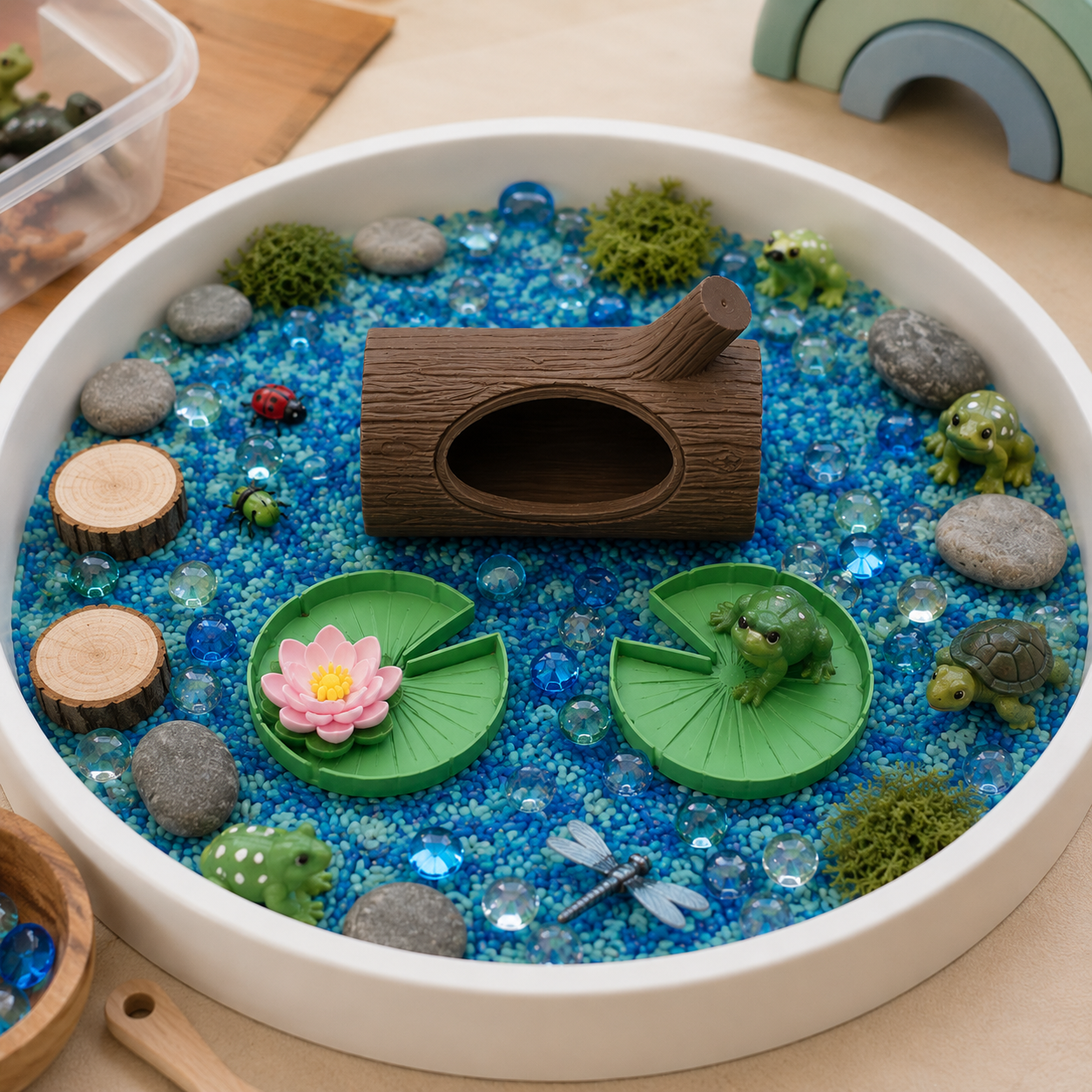 Logo frog pond sensory bin.png
