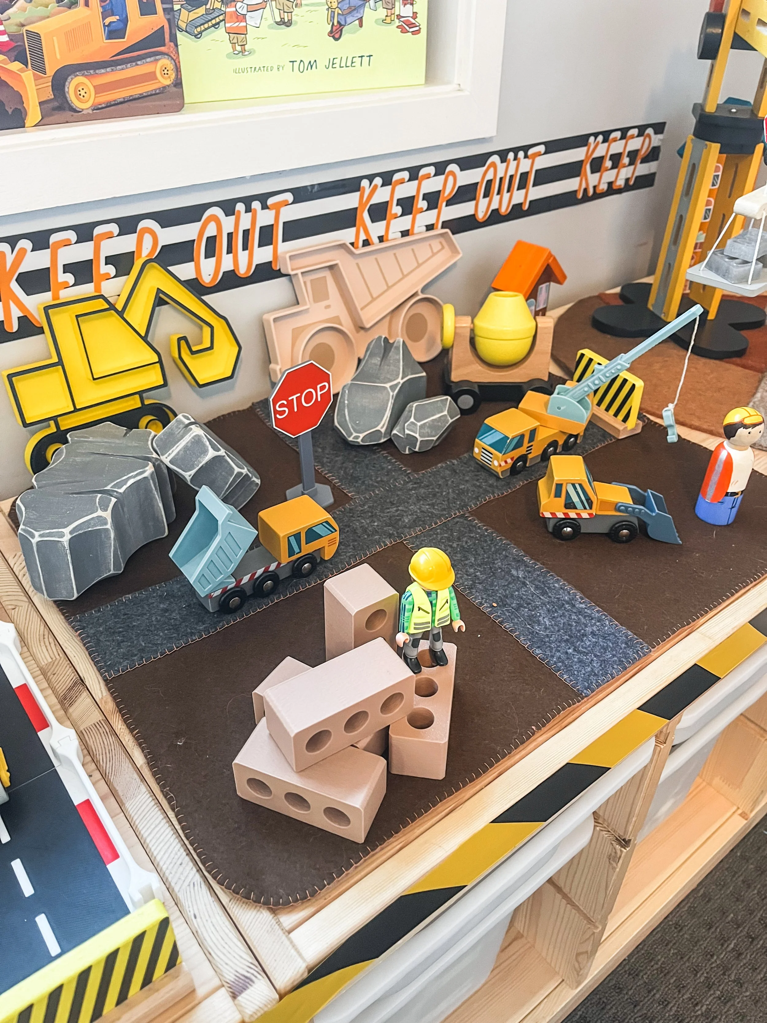contruction zone play invitation on a trofast shelving unit from ikea