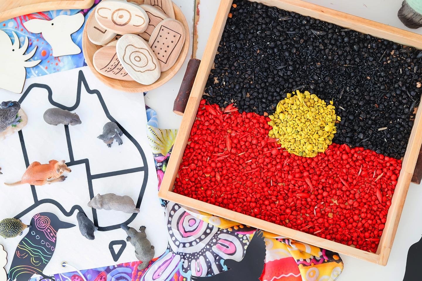 NAIDOC Week sensory play setup encouraging children to explore nature, culture, storytelling and creative play through sensory learning.