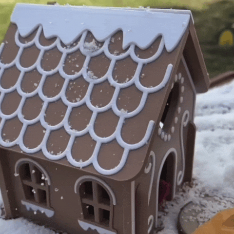 Gingerbread house snow.gif