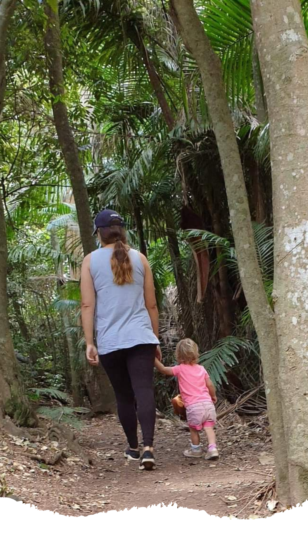 mother and toddler bushwalking. mother is the business owner