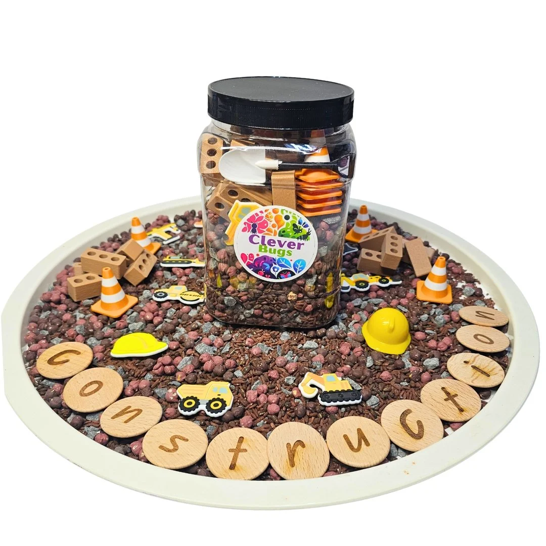 Mega Construction Sensory Kit with 800 g sensory base, construction math counters, mini eco bricks and wooden letter tokens in reusable storage jar.