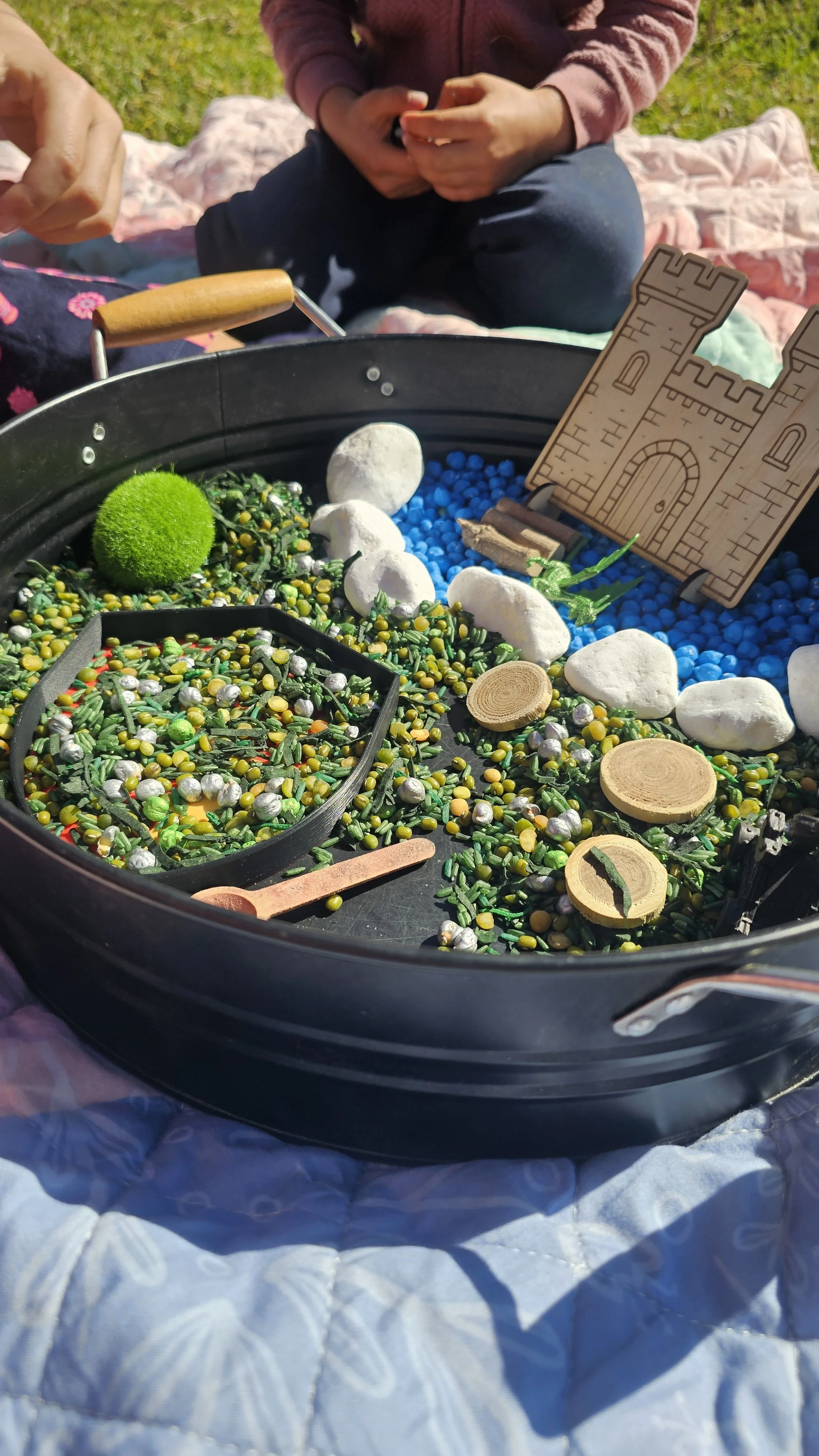 Castle-themed sensory play invitation for children.