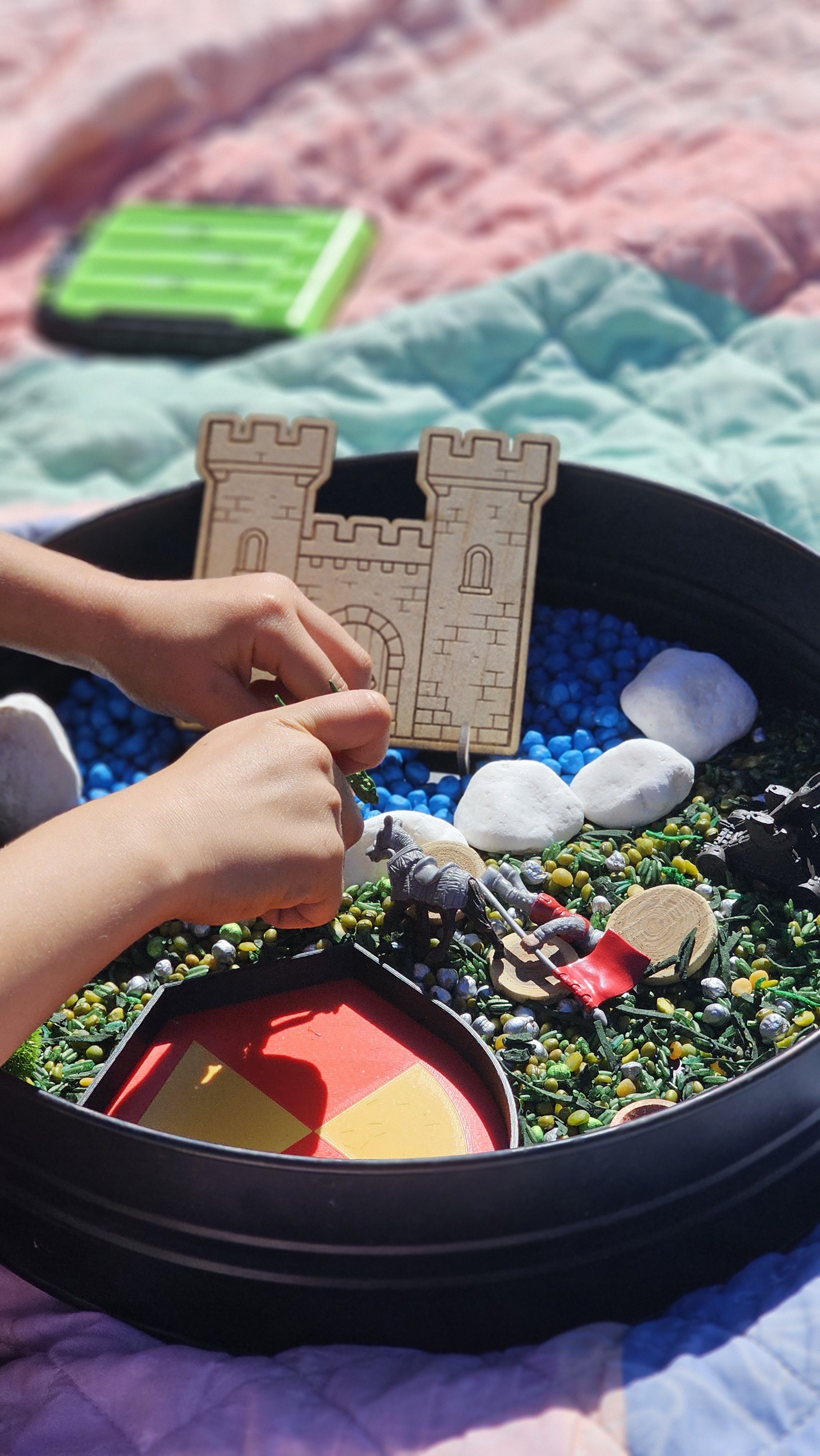 Fantasy-themed sensory play kit with reusable wooden accessories.