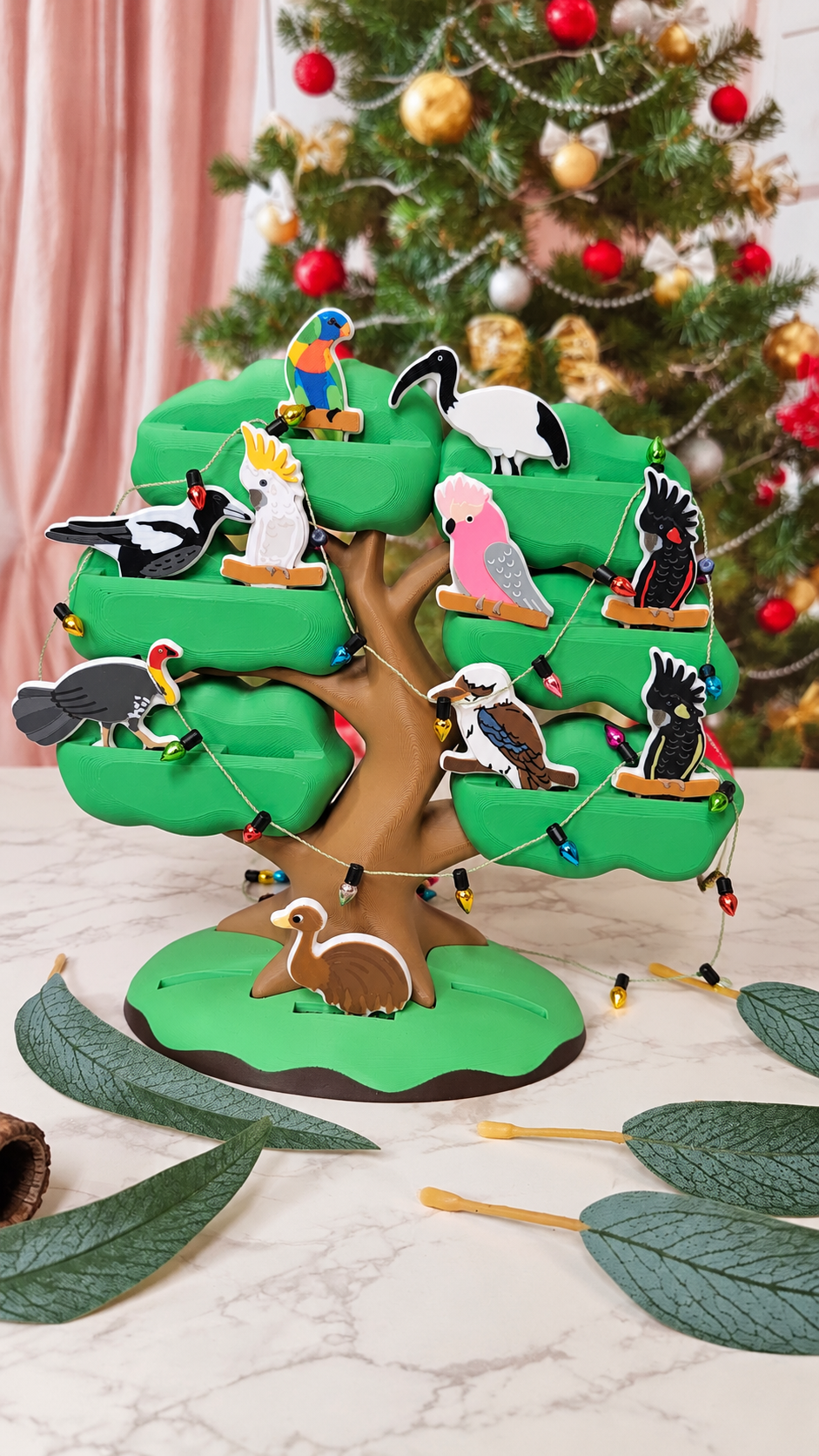native bird tree with counters and christmas decorations