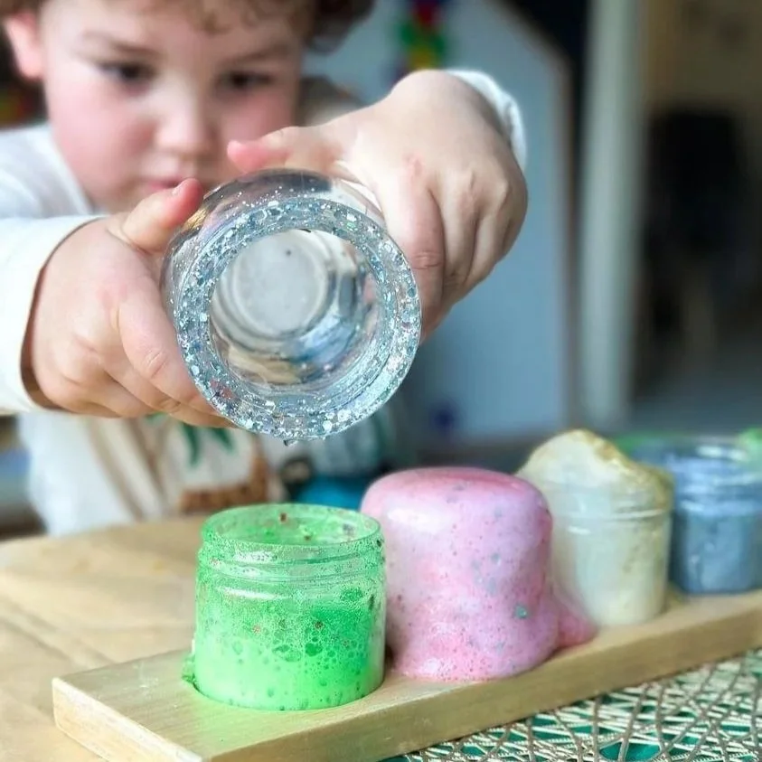 child mixing fizzy potions