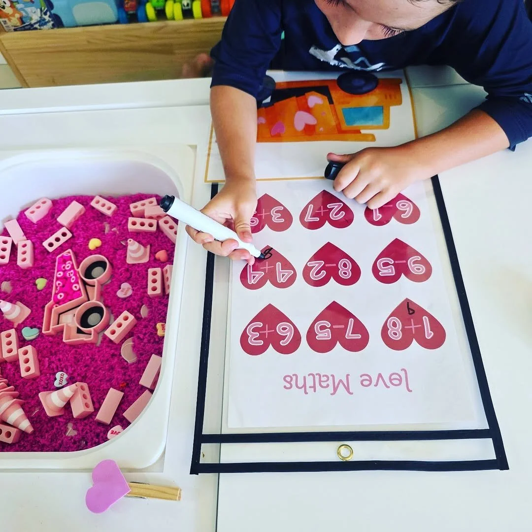 Construction themed sensory tray with dump truck design