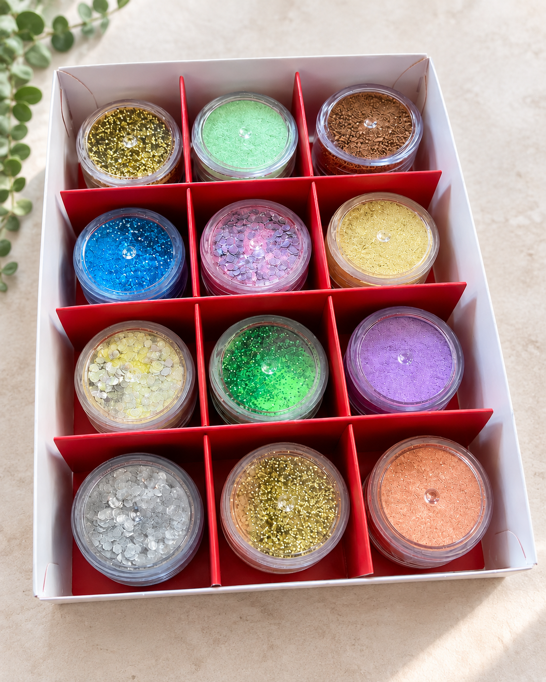 Mini jars of colourful Clever Fizz with bio glitter inside Christmas Advent Calendar