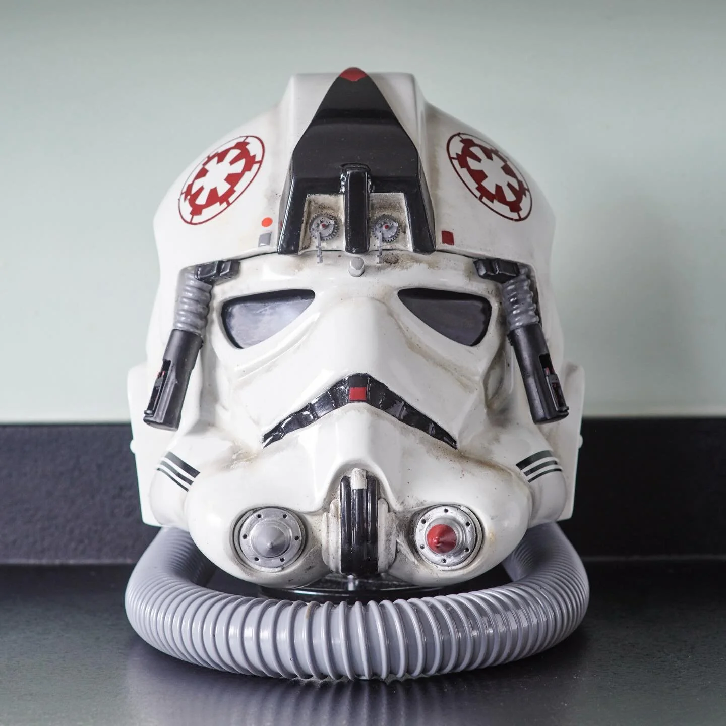 Here&rsquo;s a closer look at the AT-AT Pilot.

So for the main shell I sanded smooth, Hycote grey primer and painted in Montana &lsquo;shock white.&rsquo; Hycote matt black for the nose grill. And then Loop &lsquo;Leeds Red&rsquo; for the nose (and 