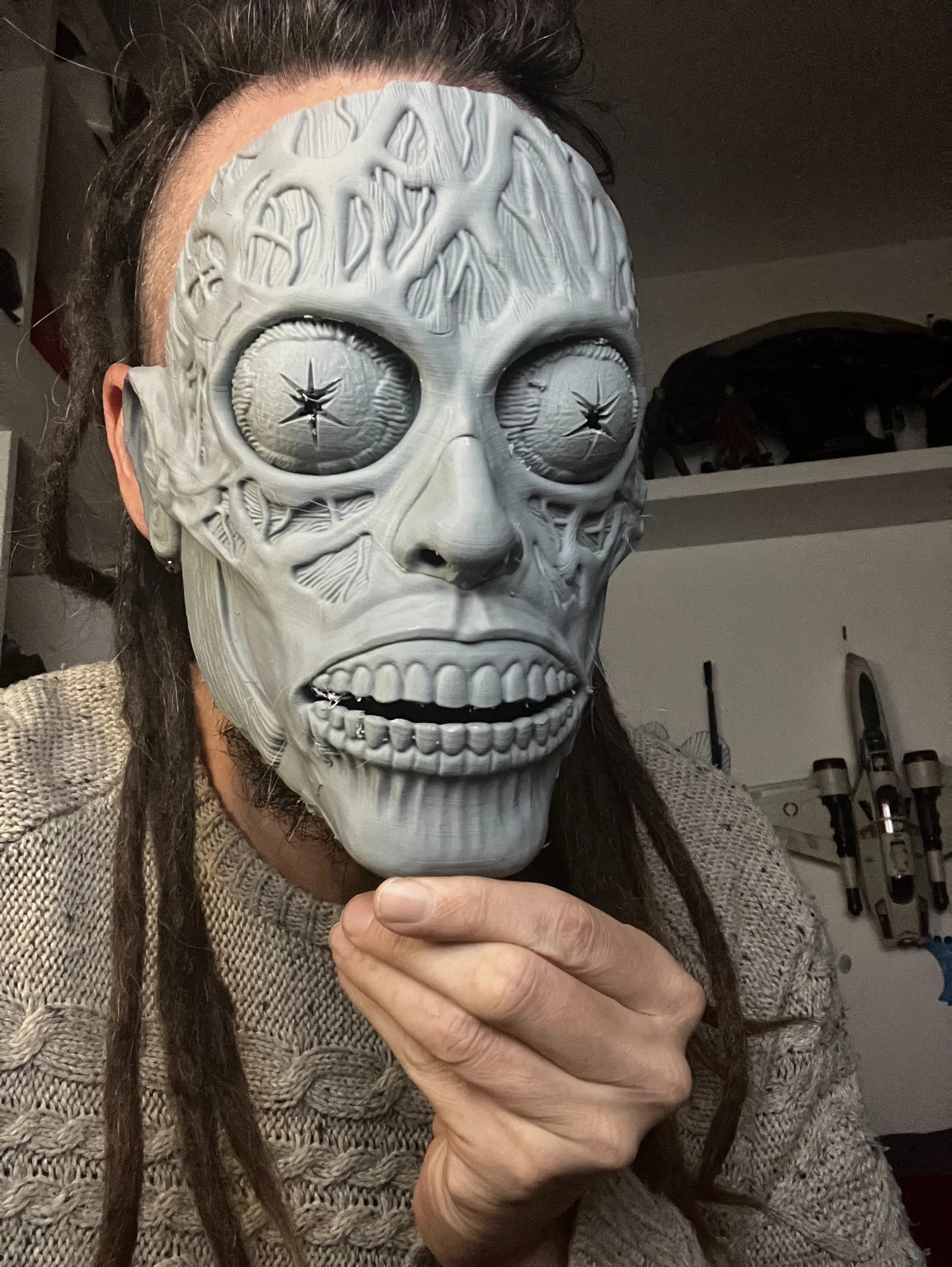 They Live mask all printed out. I scaled it a tiiiiiiinnny bit too tight but, the beauty of PLA is; you can just heat it up with heat gun and hold it wider whilst it cools down and reshape it.

This is the 3mm thick version. Printed at 0.16 LH, 8% in