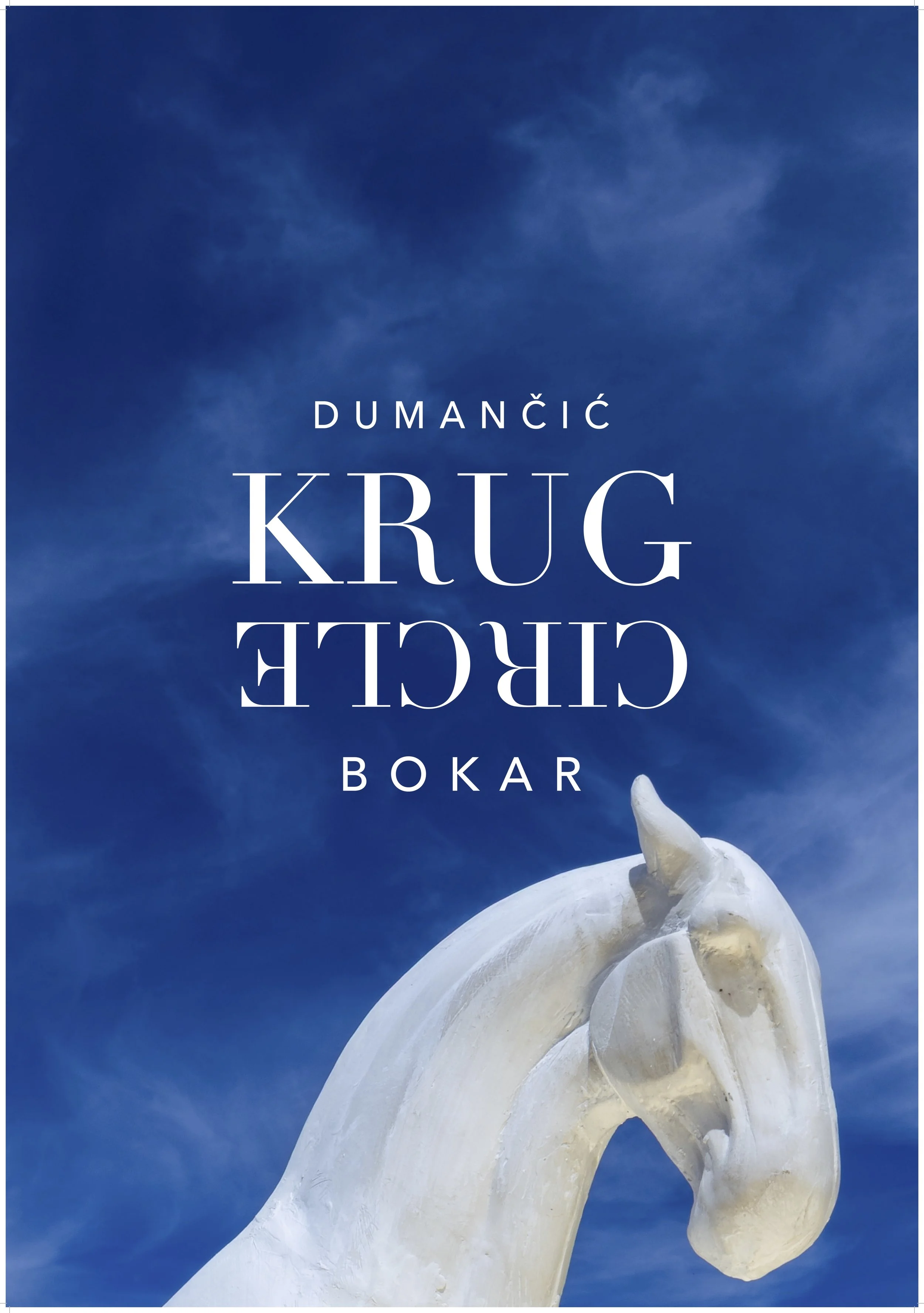 A large white sculpture of a swan with a golden crown on its head, set against a deep blue sky with clouds.