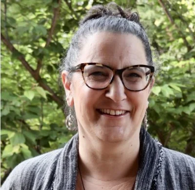 Karya Lustig, MA, ISS