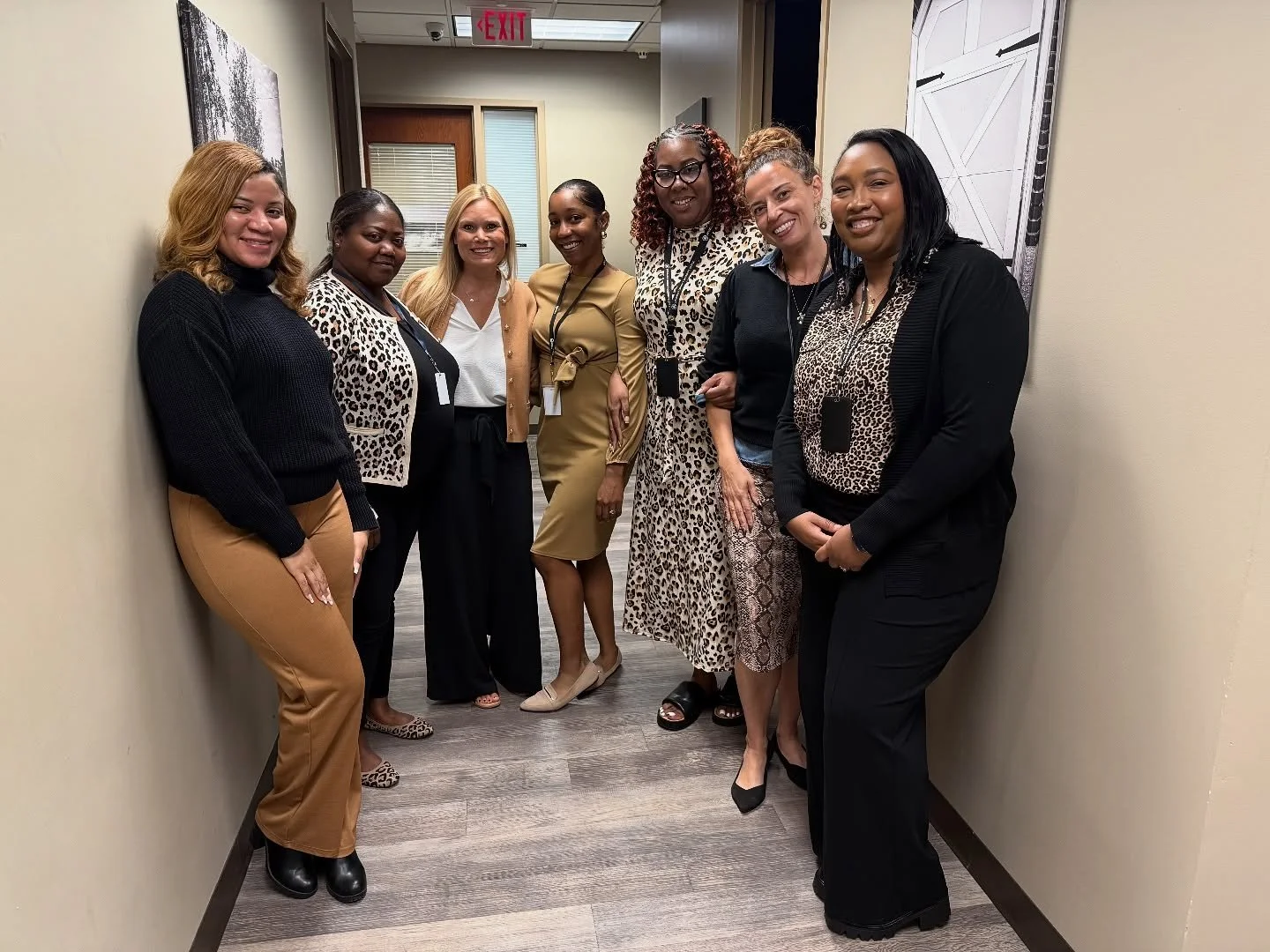 Without any preplanning, a theme emerged amongst our team members, animal print and black and tan were clearly the looks of the day on Monday!