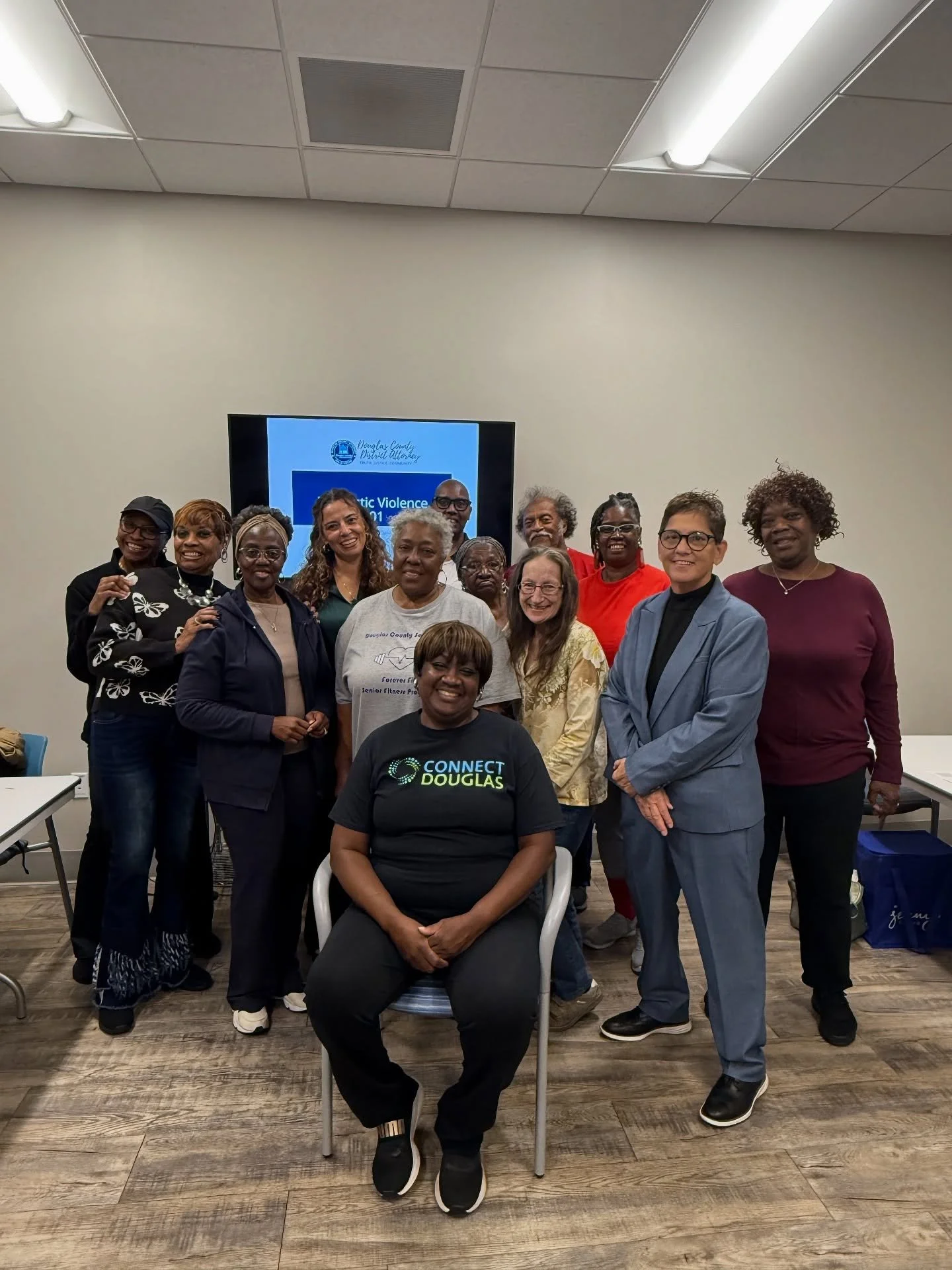 Today, District Attorney Dalia Racine spoke with a group of citizens at the Lithia Springs Senior Center in honor of Domestic Violence Awareness Month. She discussed the different forms of domestic violence, how to recognize warning signs, and resour