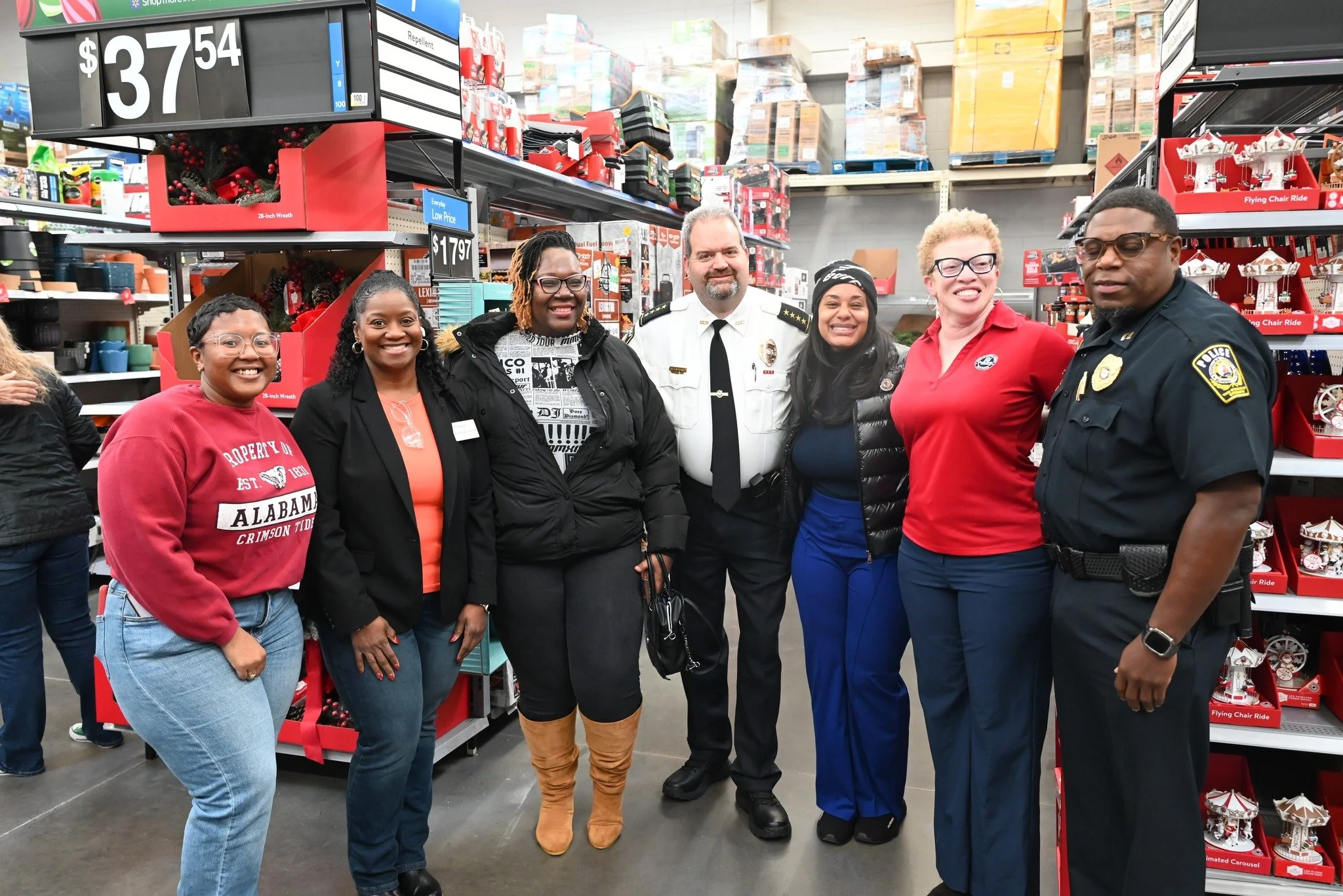 The holiday season is in full swing! Earlier this week, members of our staff joined the Douglas County School System Police Department at their Annual Shop with a Cop event! There they had the opportunity to help students pick out gifts and  were abl