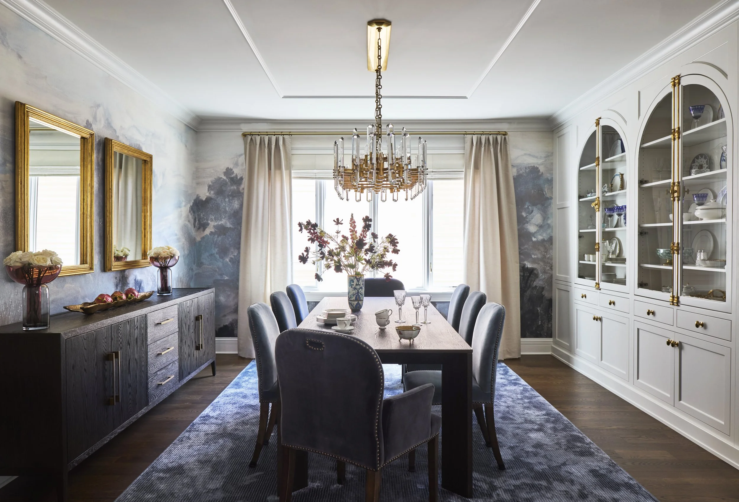 Dining Room with mural wallpaper and custom display cabinet designed by Tracy Kurc