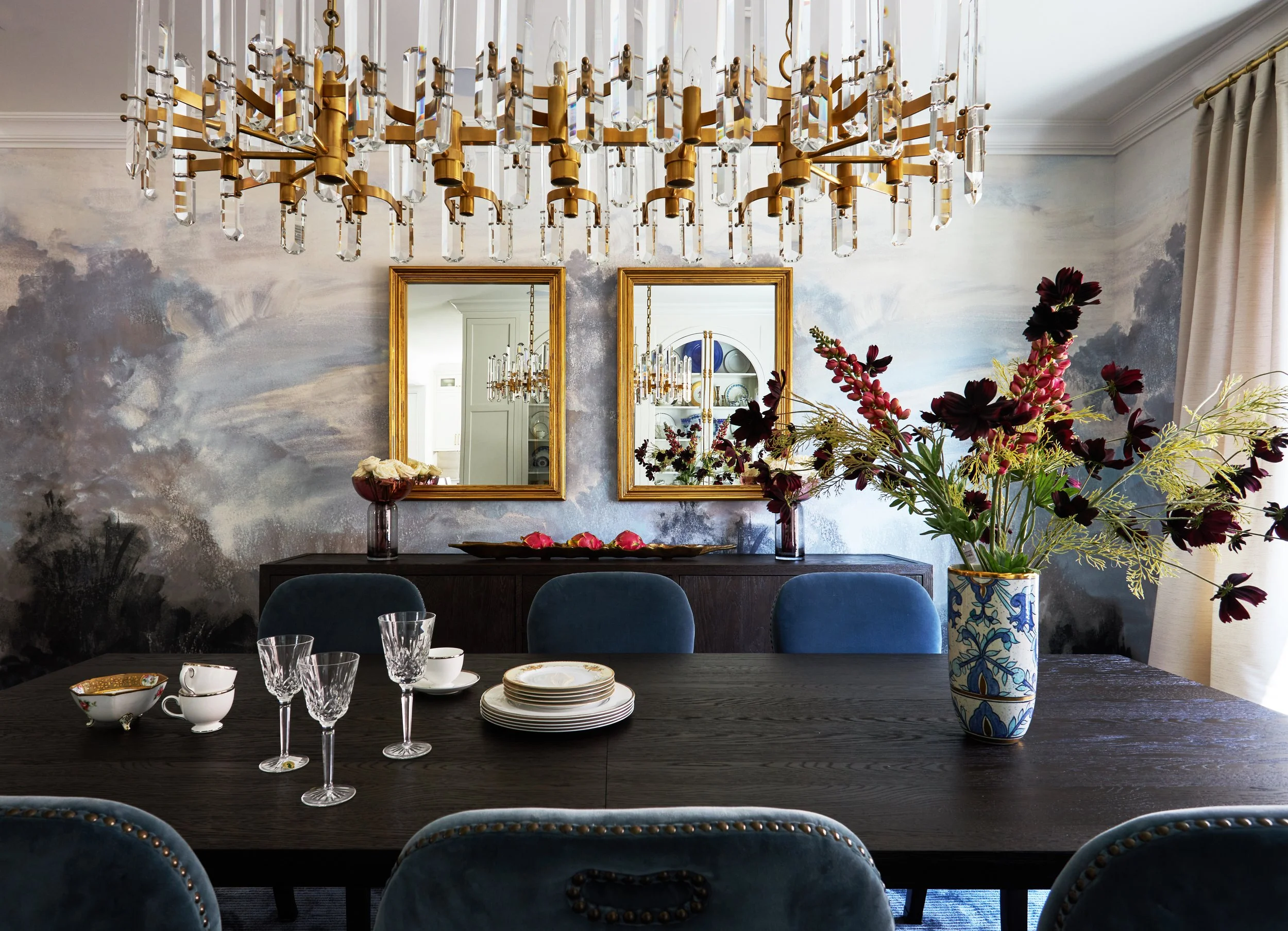 Blue Dining Room with mural wallpaper and custom display cabinet designed by Tracy Kurc