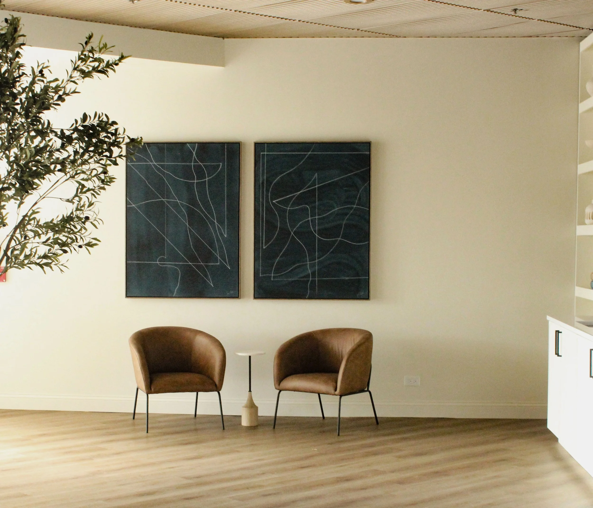 modern lounge seating and large scale art 