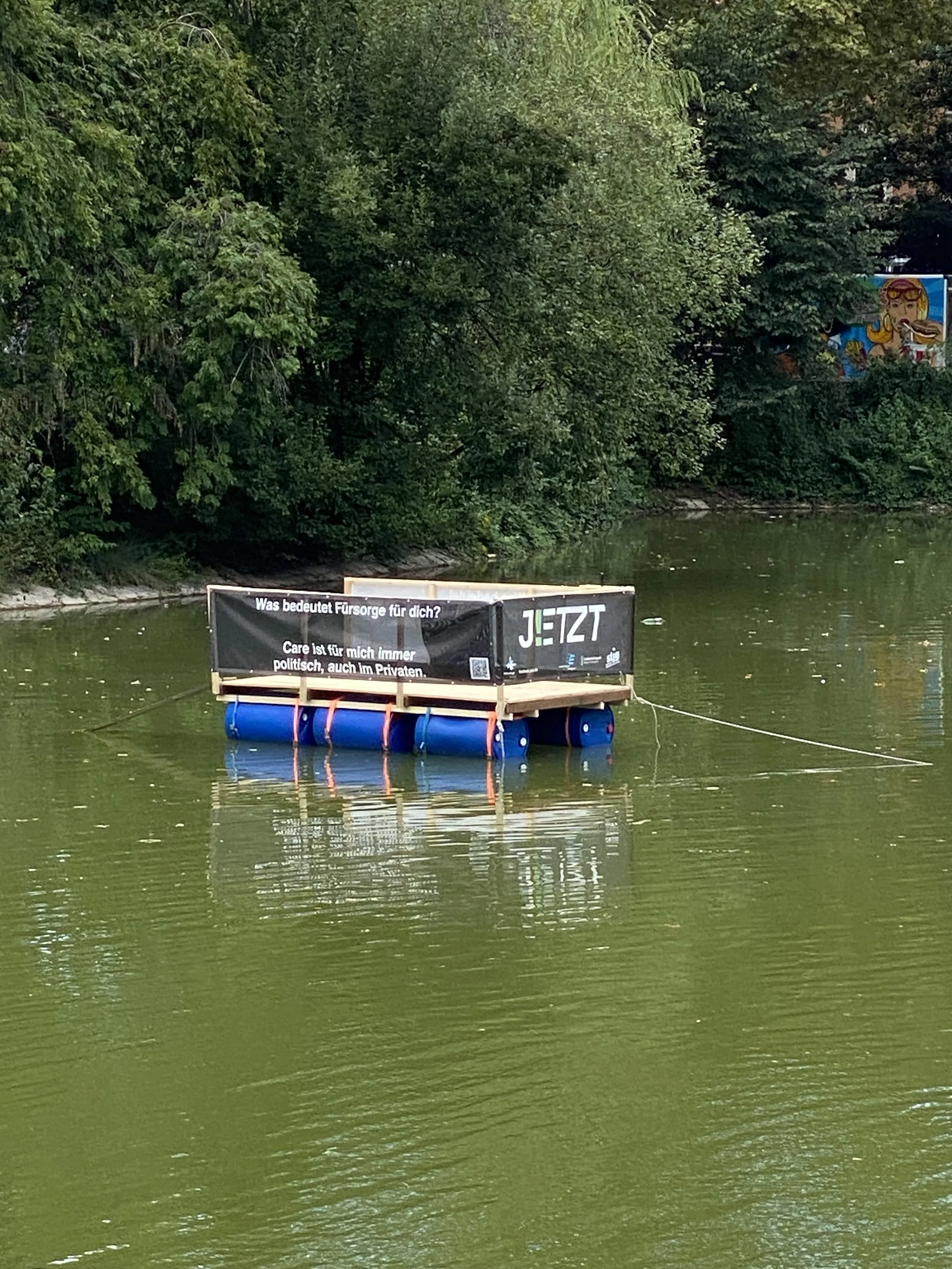 image description: installation of German iteration of Perspective at Festival der KulturRegion “JETZT!” in Germany, featuring an excerpt of the project on a boat.