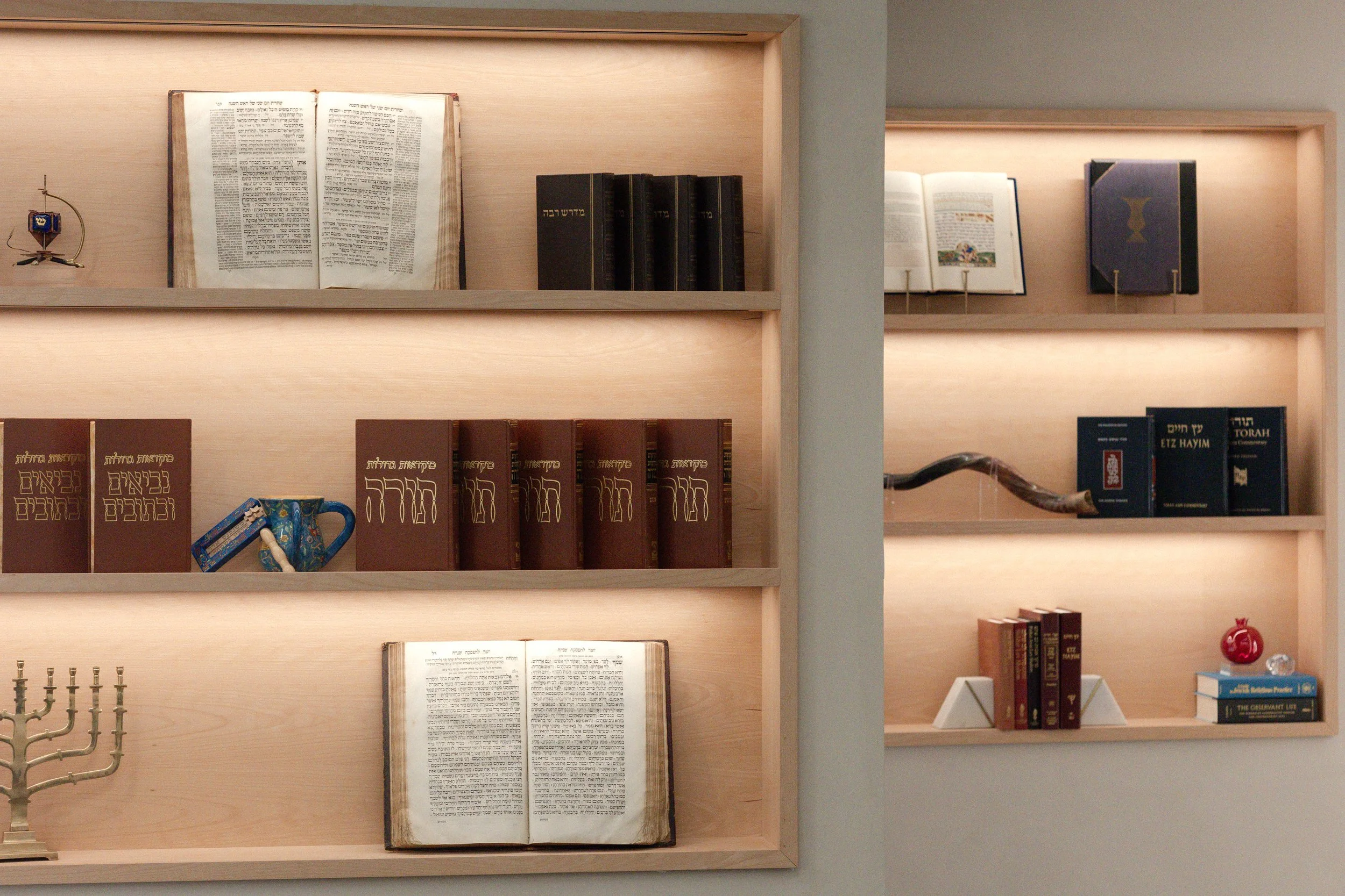 Floating bookshelves with built-in lighting