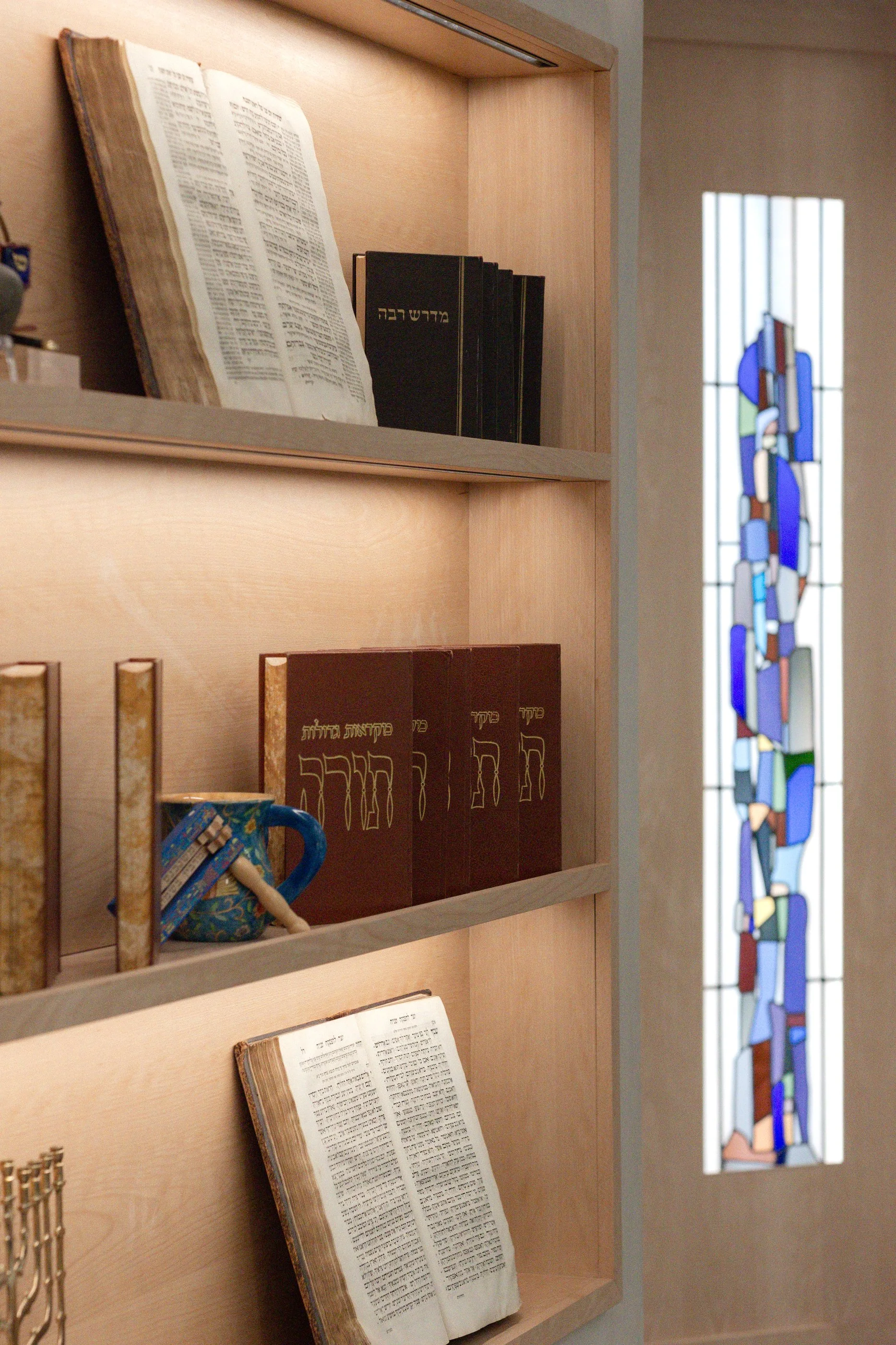 Inset lighted shelving by Casa Dega