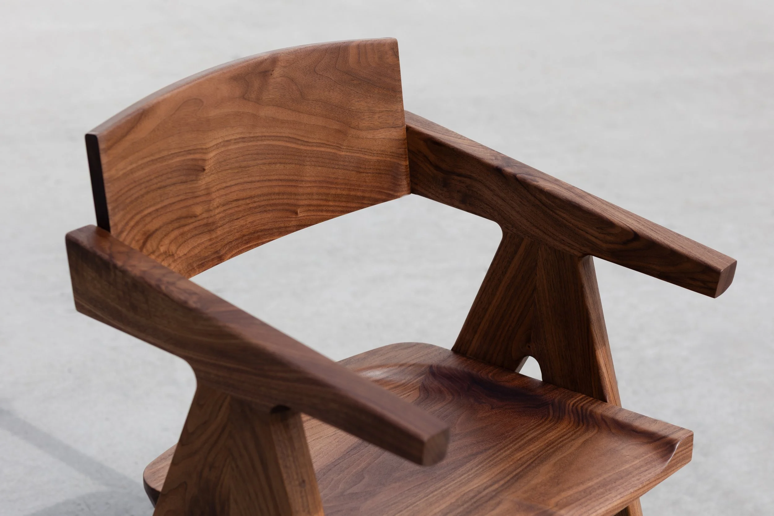 Solid walnut statement dining chair