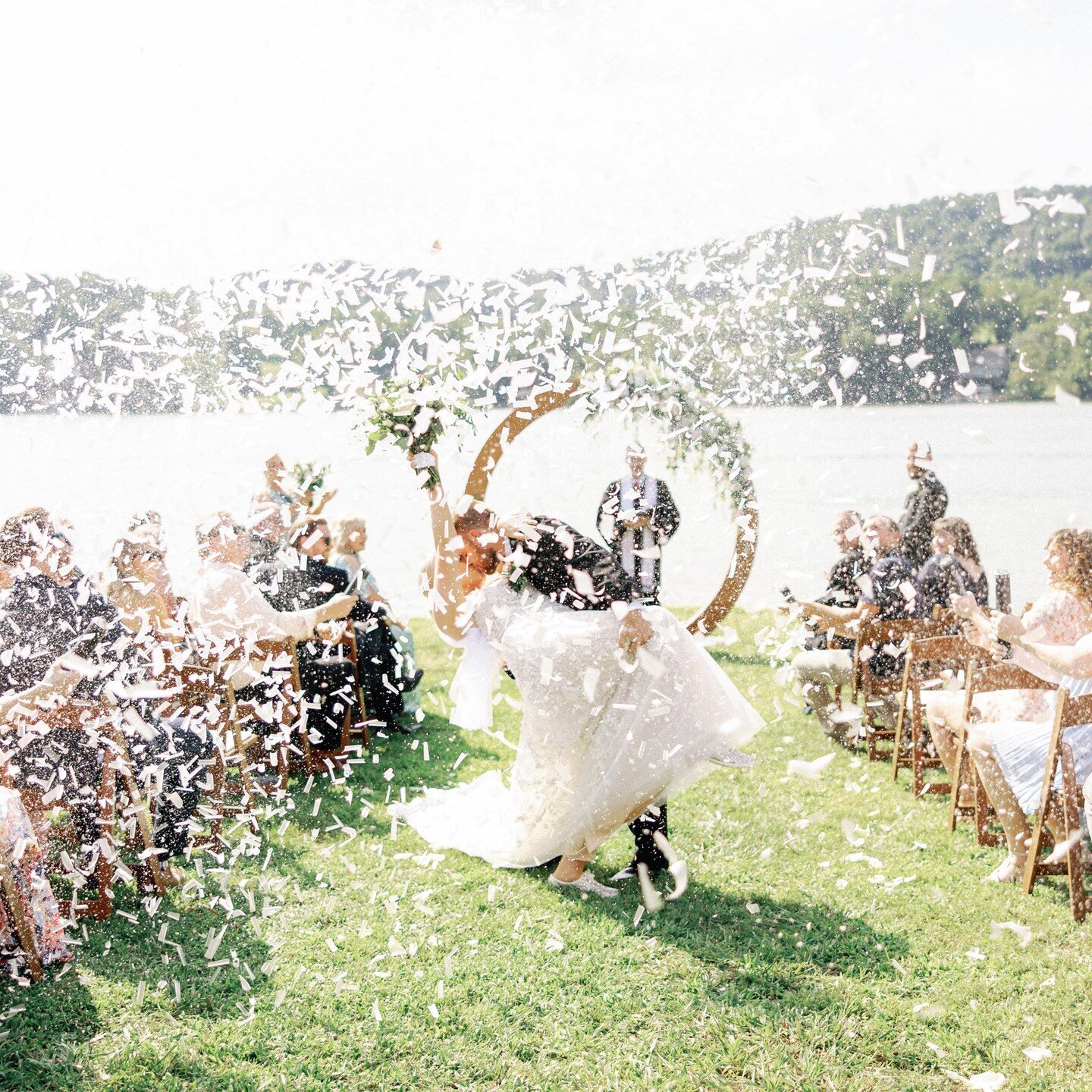 (cue the biodegradable confetti)

Let the celebration begin! Loving this dramatic send off after the I Do's 🤍

photo:@emilywakinphoto