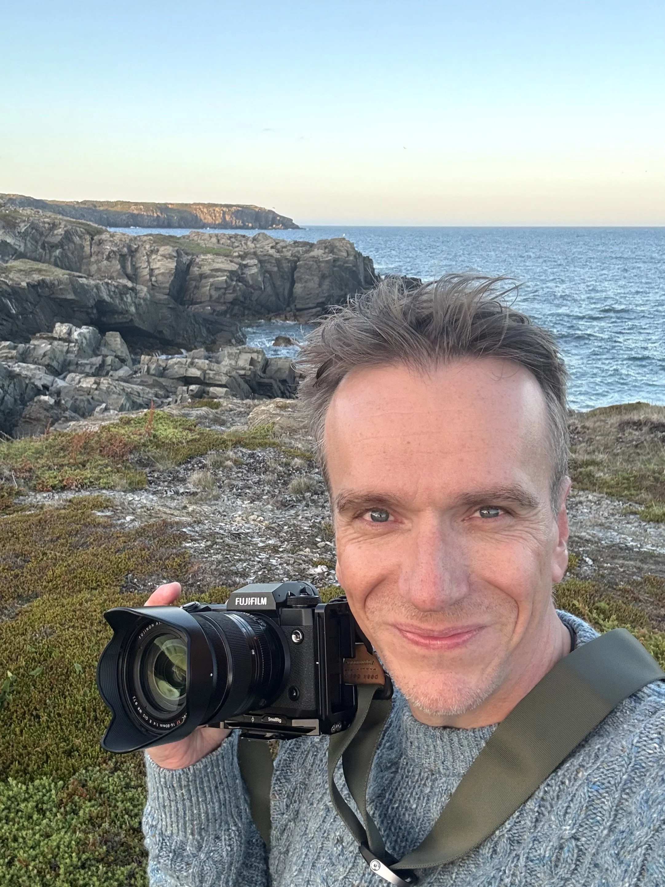 Landscape Photographer 'Matthew Martin',  Shot taken Bonavista Peninsula, Newfoundland, Canada near the ocean with cliffs in the background during sunset.