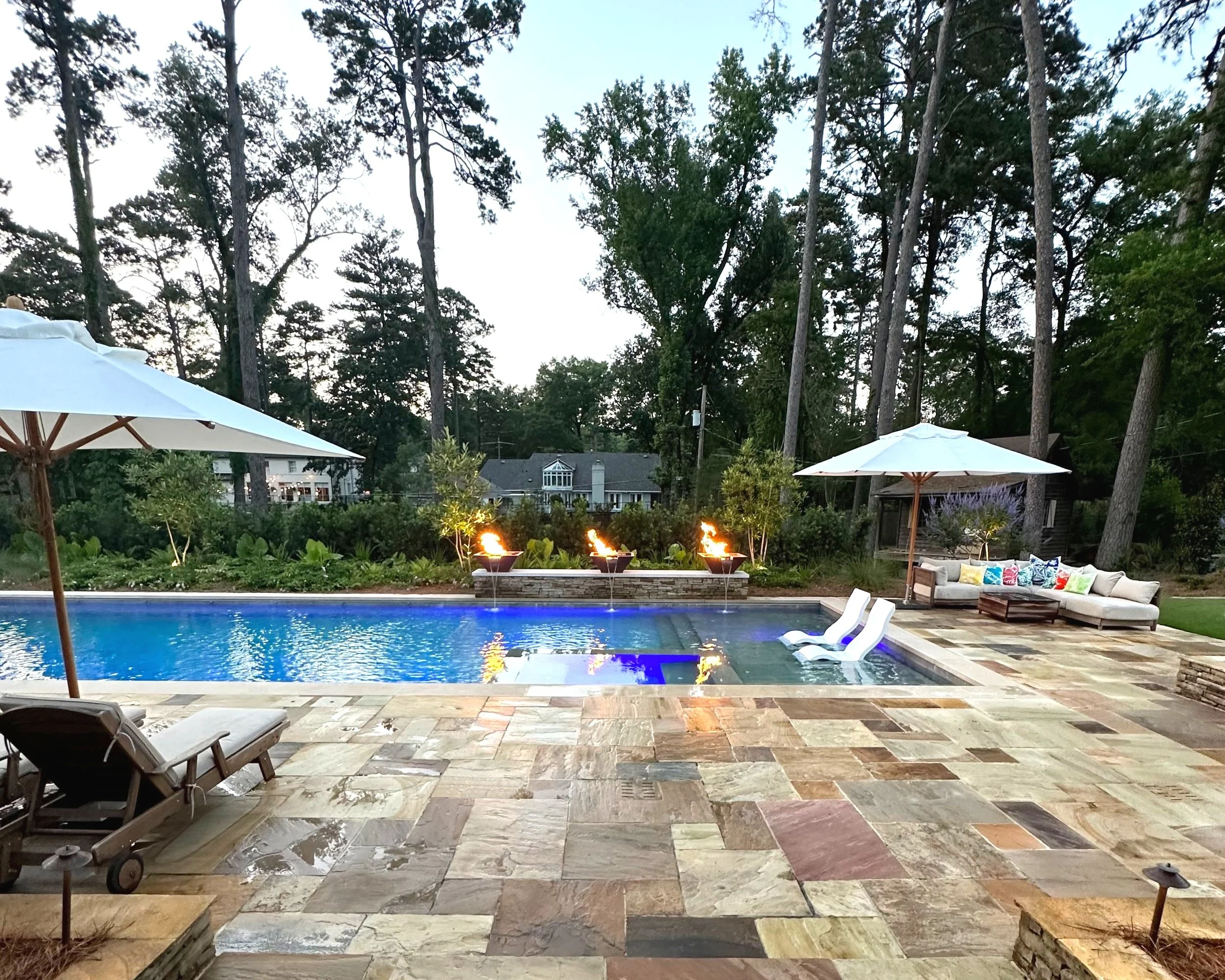 Swimming pool, spa and dual water/ fire feature design, engineering and construction by Waterscapes NWLA.