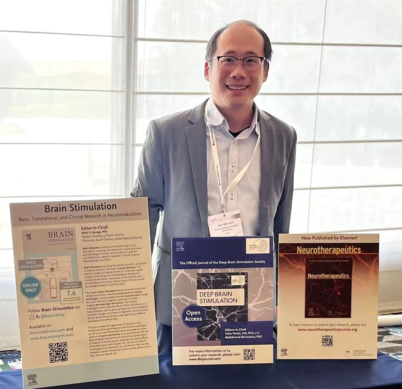 2025-02-24 Associate Editor LWL promoting Deep Brain Stimulation journal at the Brain Stimulation journal conference Kobe