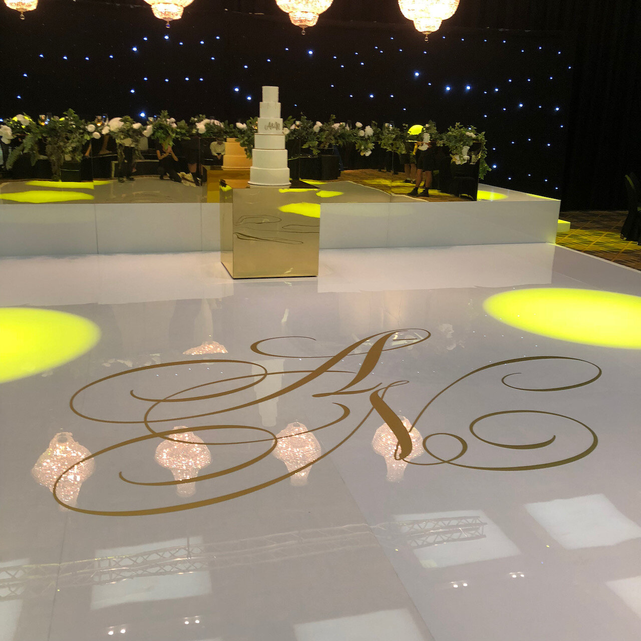 Dance floor decal gold vinyl on white acrylic 4.jpeg