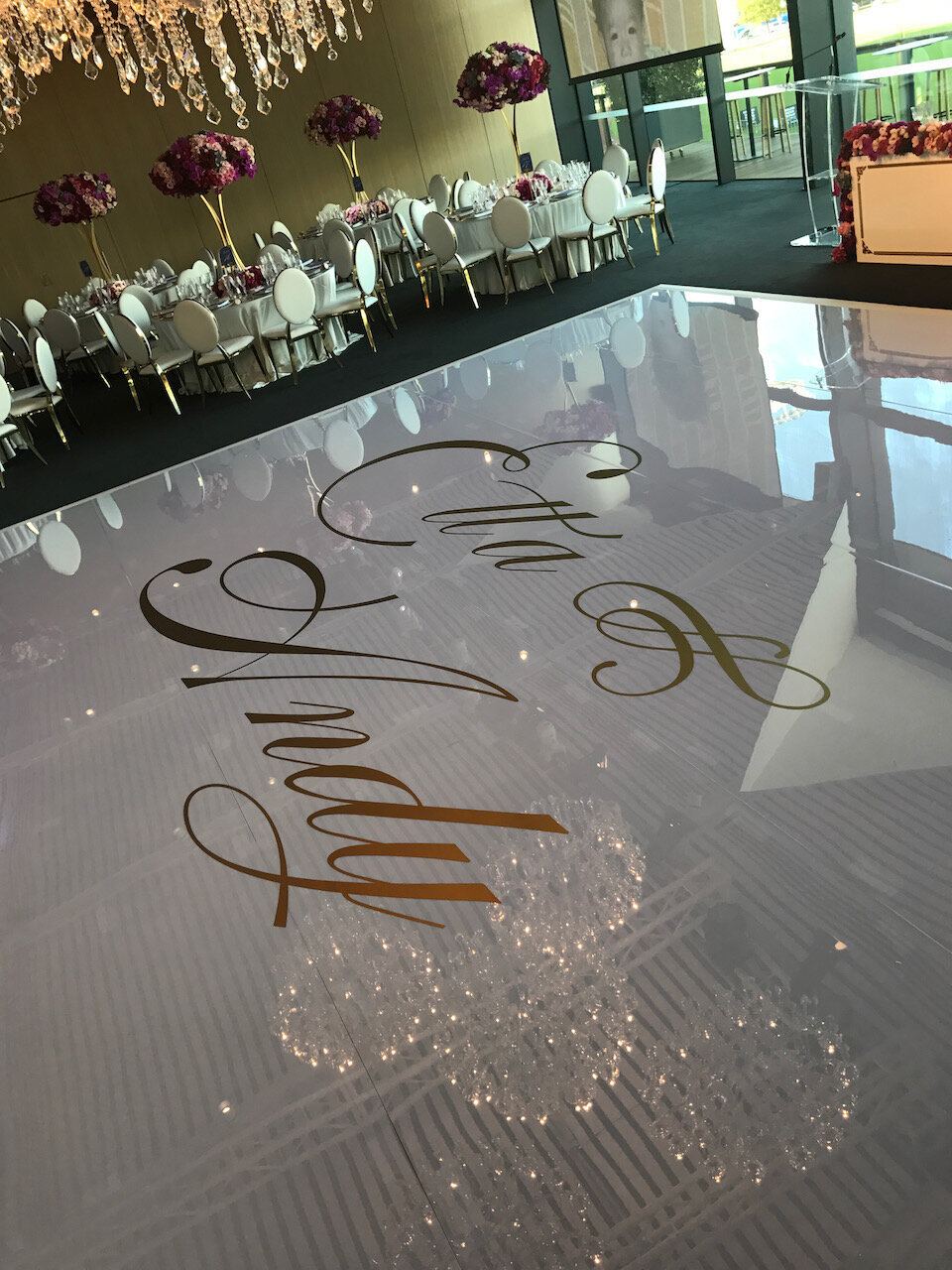 Dance floor decal gold vinyl on white acrylic 2.jpeg