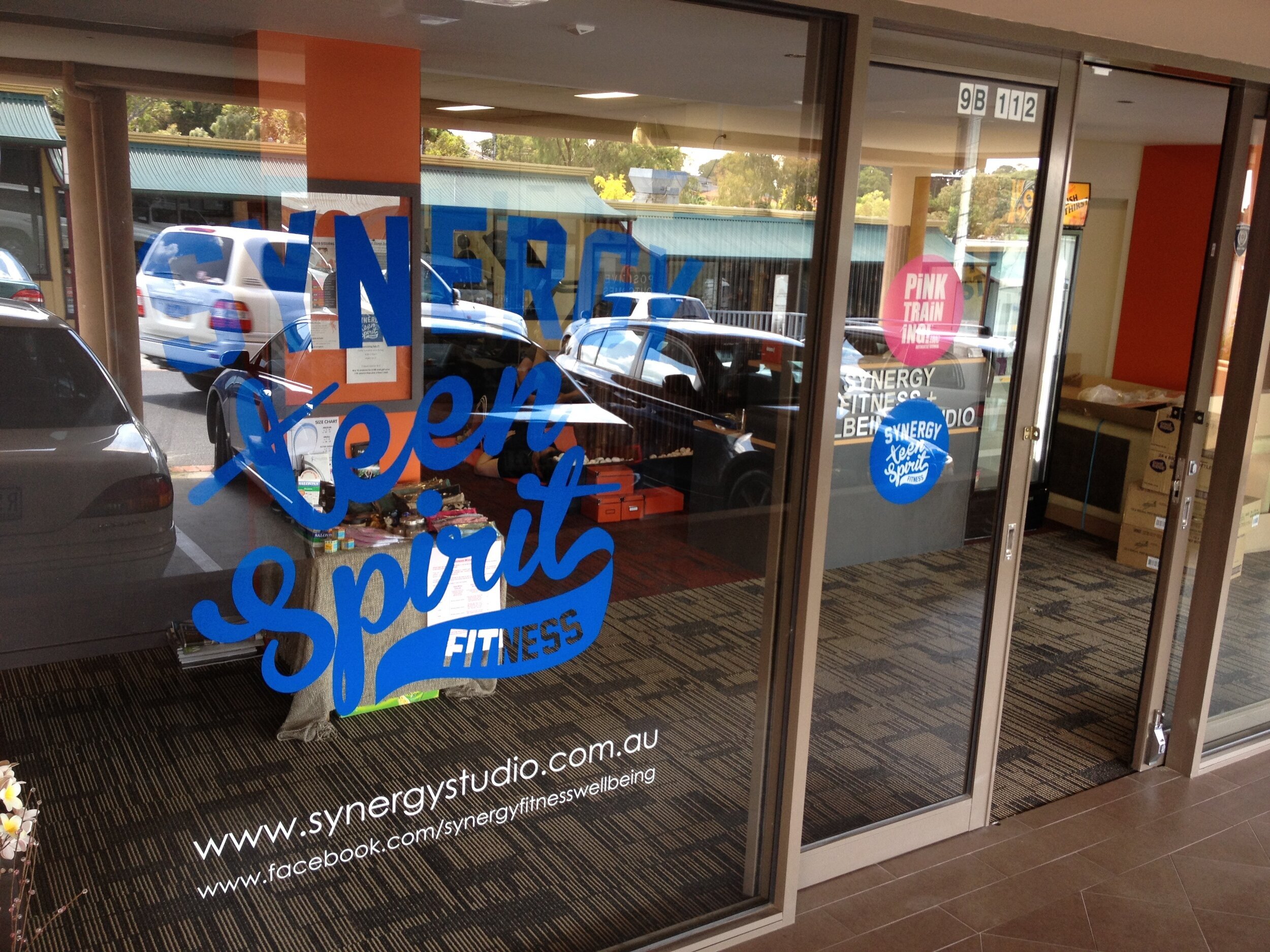 Synergy Studio window signage.jpg