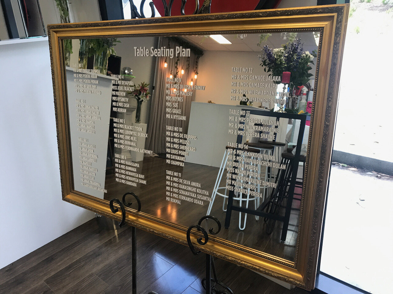 Mirror seating plan vinyl lettering signage.jpeg