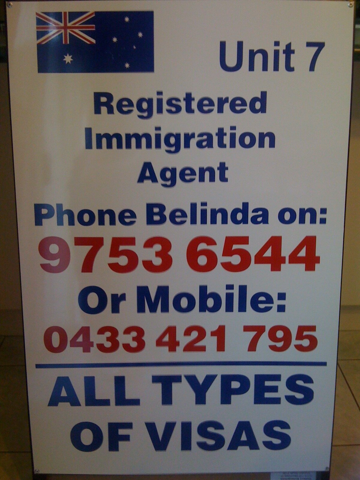 Registered immigration agent Aframe sign.jpg